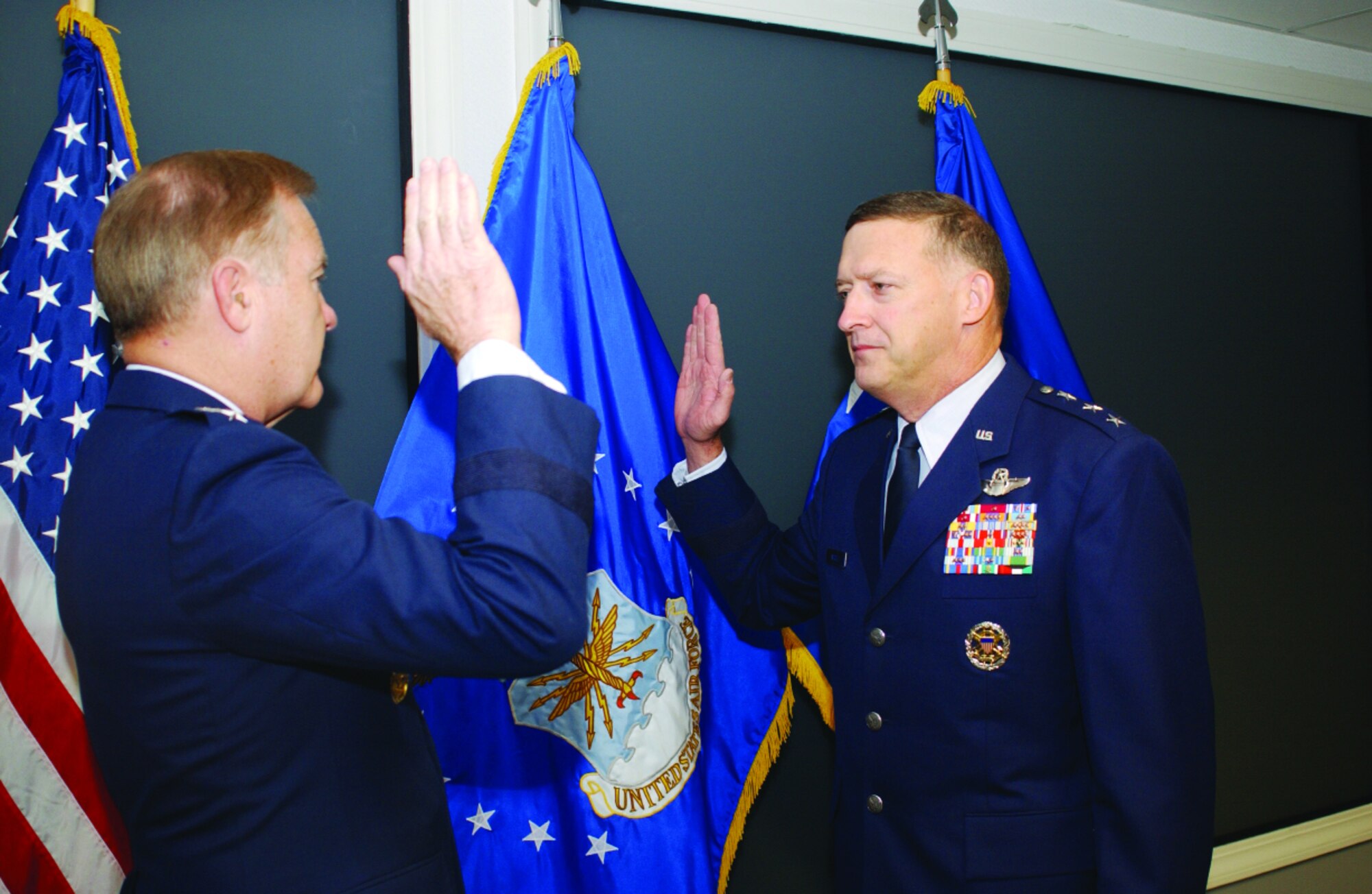 Gen. Keys (left), administers the oath of office to Gen. North during his promotion ceremony to lieutenant general Feb. 16.