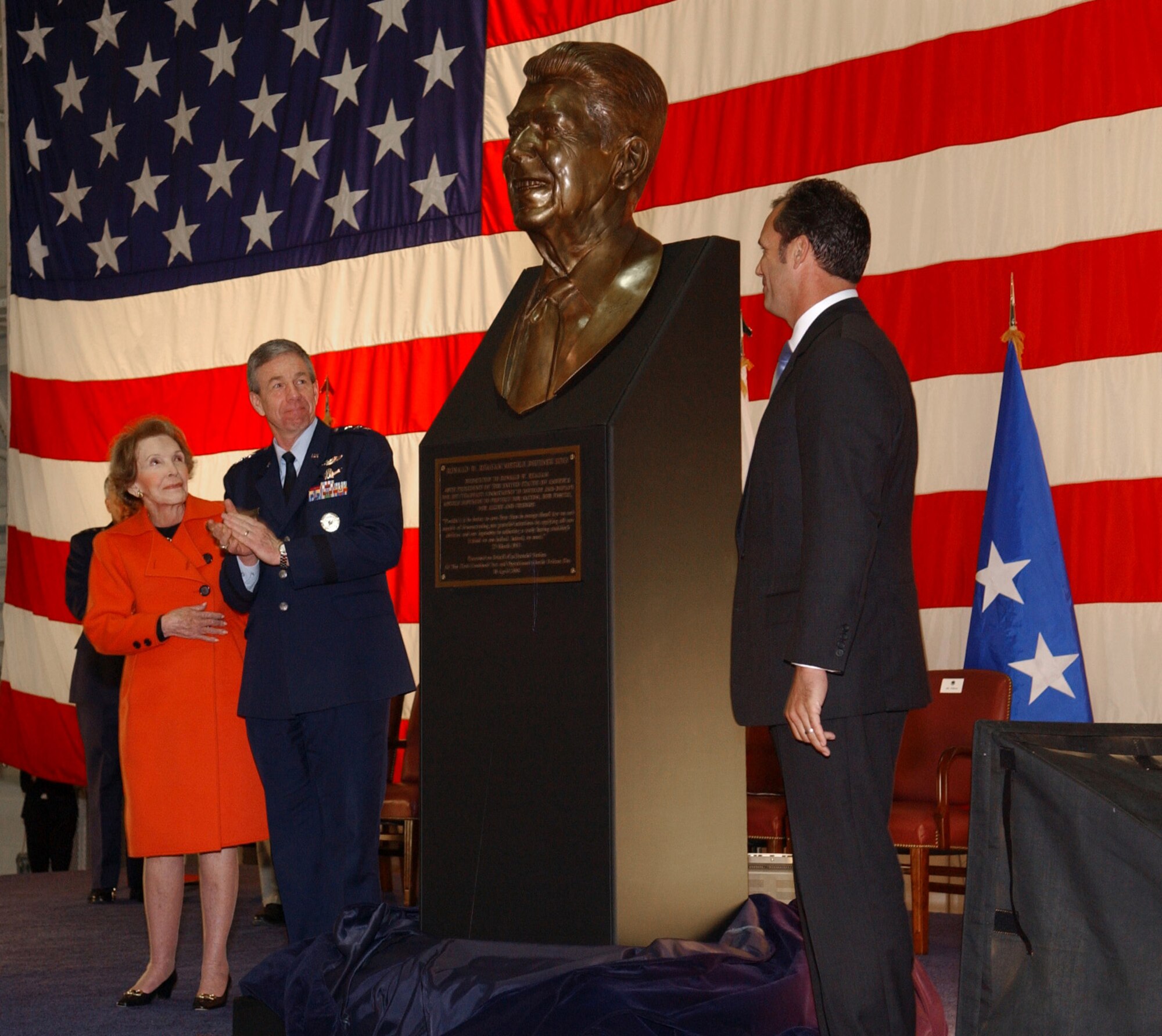Former First Lady Nancy Reagan, Lt. Gen Henry A. "Trey" Obering III and Riki Ellison admire a bust of the 40th president unveiled at the Ronald W. Reagan Missile Defense Site dedication ceremony at Vandenberg Air Force Base, Calif., on Monday, April 10, 2006. General Obering is the Air Force director of the Missile Defense Agency and Mr. Ellison is the founder of the Missile Defense Advocacy Alliance. (U.S. Air Force photo/Tech. Sgt. Scott Seyer) 
