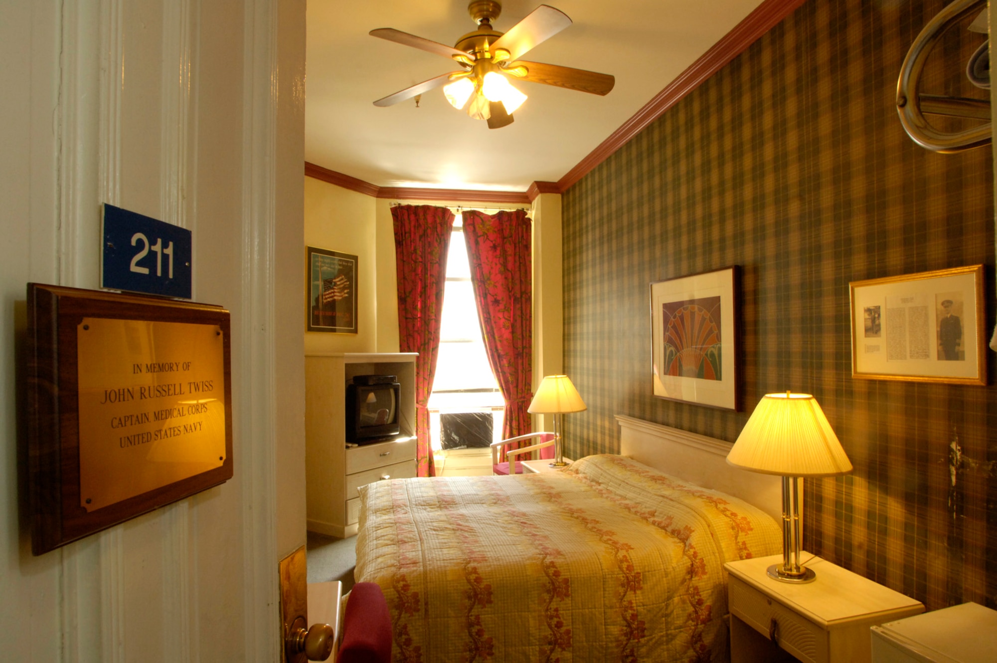 A typical room at the Soldiers', Sailors', Marines' and Airmen's Club in Manhattan, this one has been renovated in honor of Navy Capt. John Russell Twiss. Many rooms are decorated in honor of servicemembers from all branches. (U.S. Air Force photo/Master Sgt. Scott Wagers)
