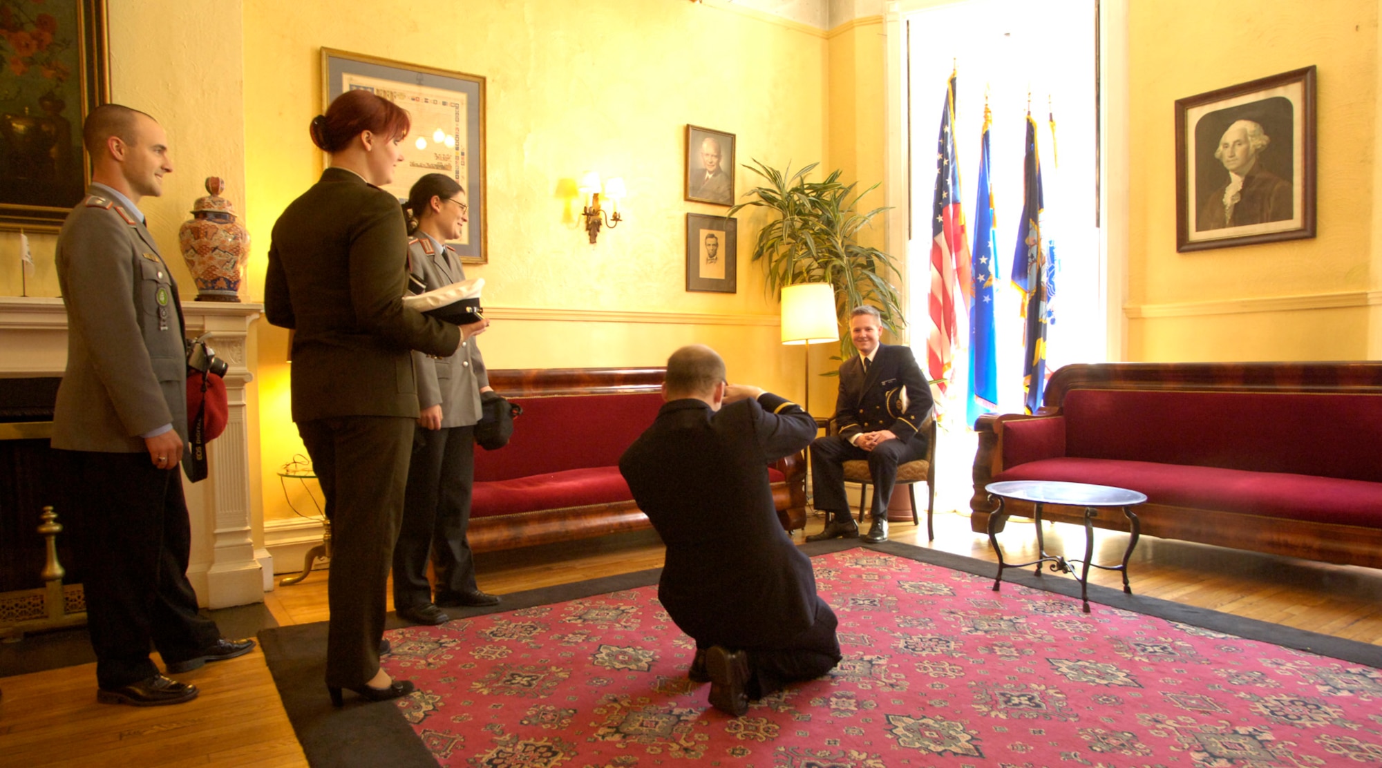 German and Latvian servicememembers in town for a United Nations conference stop by to see the Soldiers', Sailors', Marines' and Airmen's Club in Manhattan. Ensign Matthias Dreschler poses for a photo.  (U.S. Air Force photo/Master Sgt. Scott Wagers) 