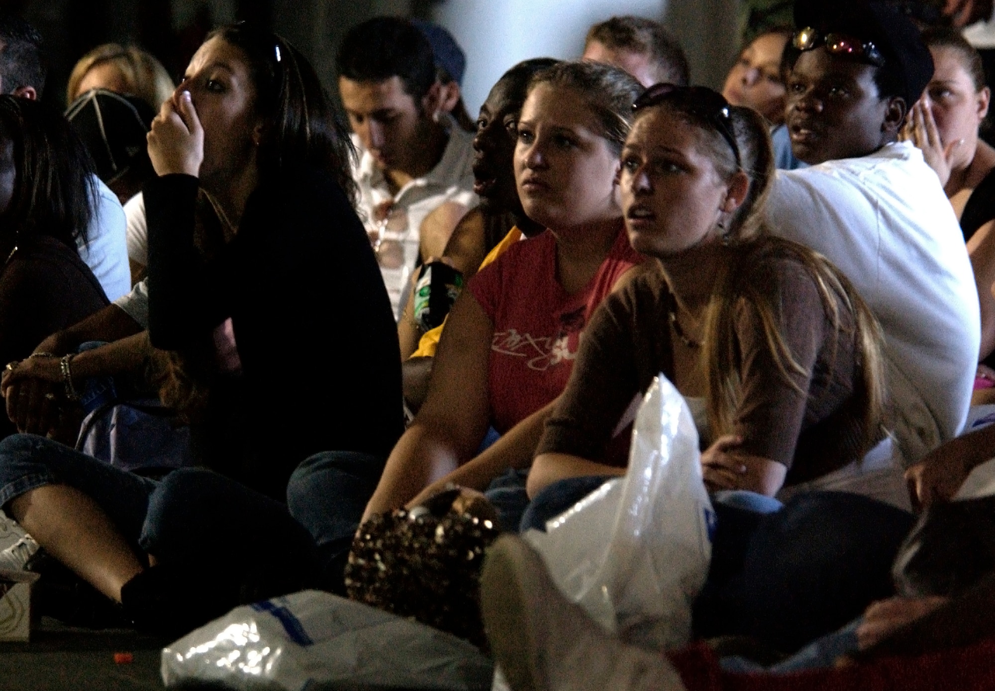 Students react to graphic images of vehicle accidents during a slide presentation on Tuesday, April 11, 2006 at Patrick Air Force Base, Fla. The presentation was part of Operation NOW -- Not on Our Watch -- designed to shock students into safer driving. (U.S. Air Force photo/Master Sgt. Jack Braden)
