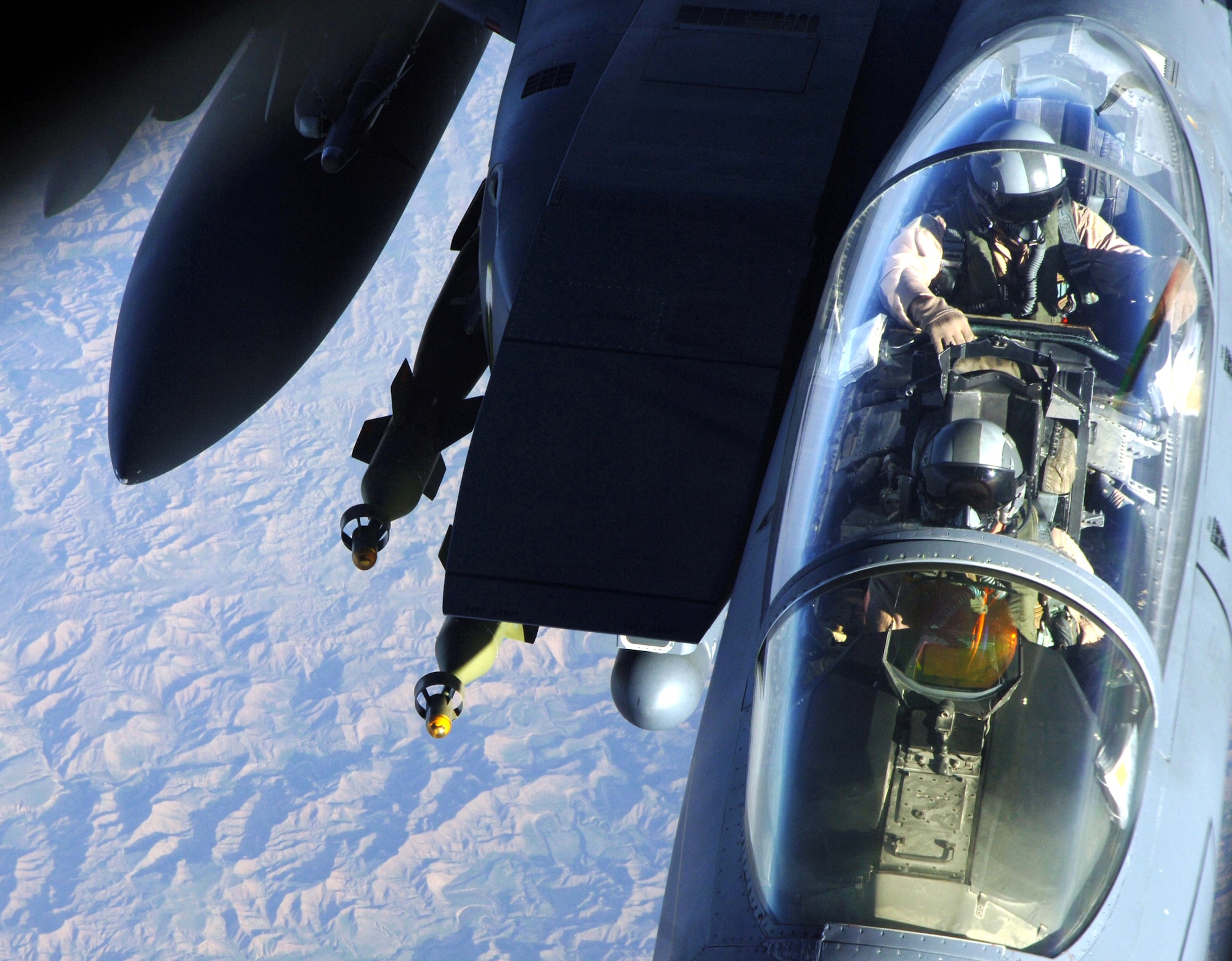 An F-15E Strike Eagle is refueled by a KC-135 Stratotanker over Southwest Asia on Tuesday, April 11, 2006. The F-15E is deployed to the 336th Expeditionary Fighter Squadron from Seymour Johnson Air Force Base, N.C. The KC-135 is deployed to the 340th Expeditionary Air Refueling Squadron from Fairchild Air Force Base, Wash. (U.S. Air Force photo/Staff Sgt. Joshua Strang)