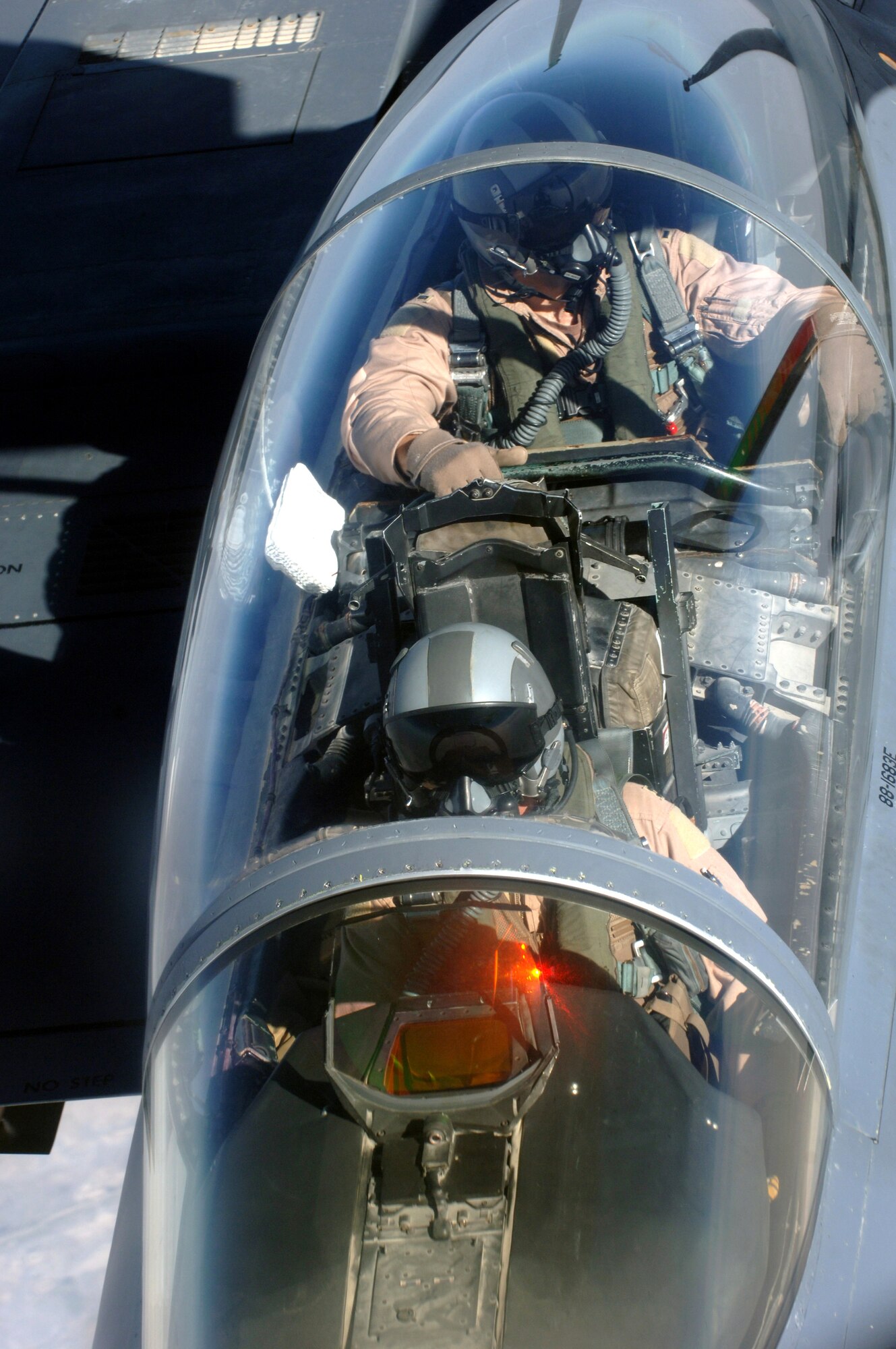 An F-15E Strike Eagle from the 336th Expeditionary Fighter Squadron is refueled over Southwest Asia by a KC-135 Stratotanker from the 340th Expeditionary Air Refueling Squadron on Tuesday, April 11, 2006. The F-15E is deployed from Seymour Johnson Air Force Base, N.C., and the KC-135 is from Fairchild AFB, Wash. (U.S. Air Force photo/Staff Sgt. Joshua Strang)