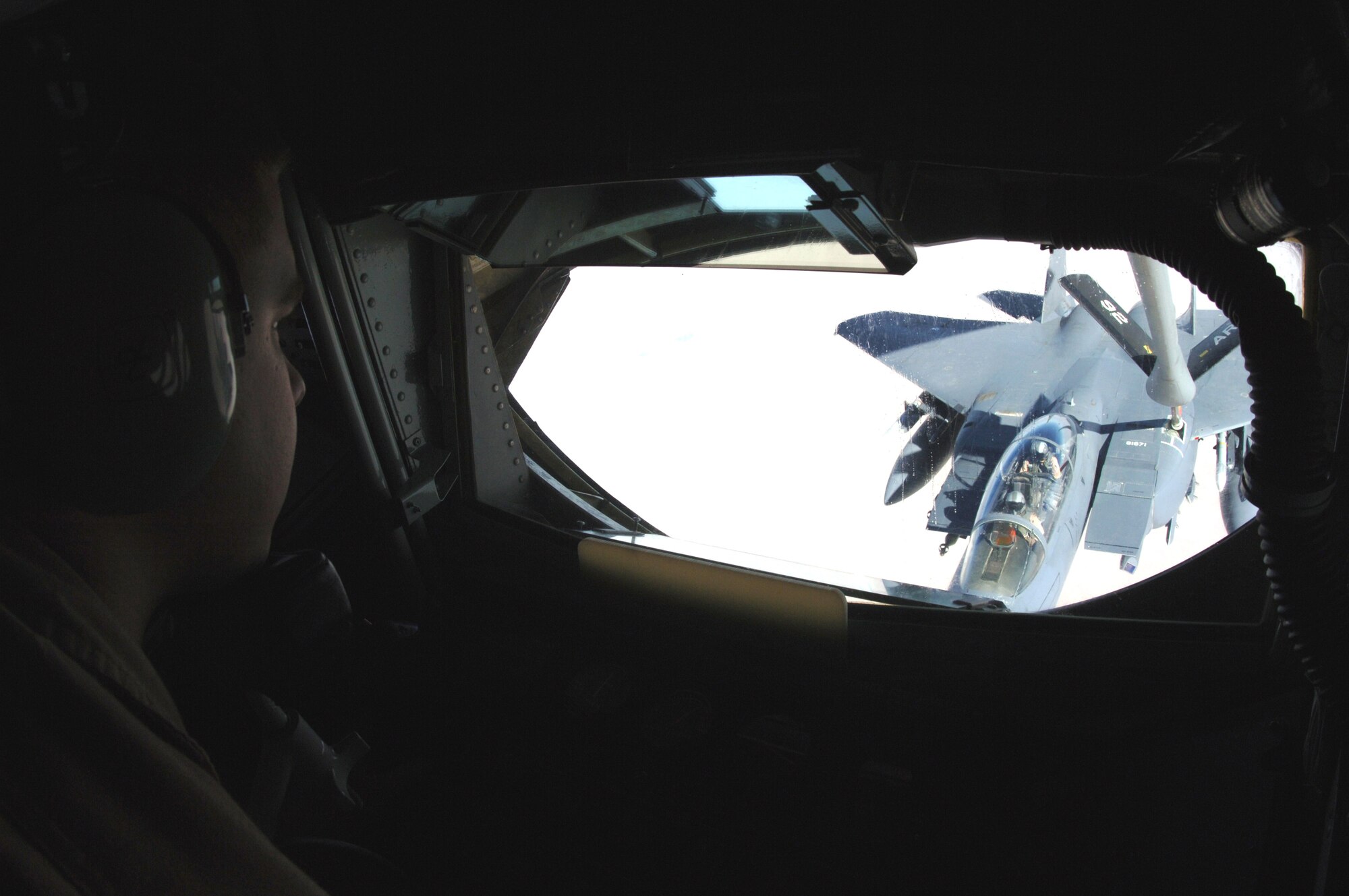An F-15E Strike Eagle from the 336th Expeditionary Fighter Squadron is refueled over Southwest Asia by a KC-135 Stratotanker from the 340th Expeditionary Air Refueling Squadron on Tuesday, April 11, 2006. The F-15E is deployed from Seymour Johnson Air Force Base, N.C., and the KC-135 is from Fairchild AFB, Wash. (U.S. Air Force photo/Staff Sgt. Joshua Strang) 
