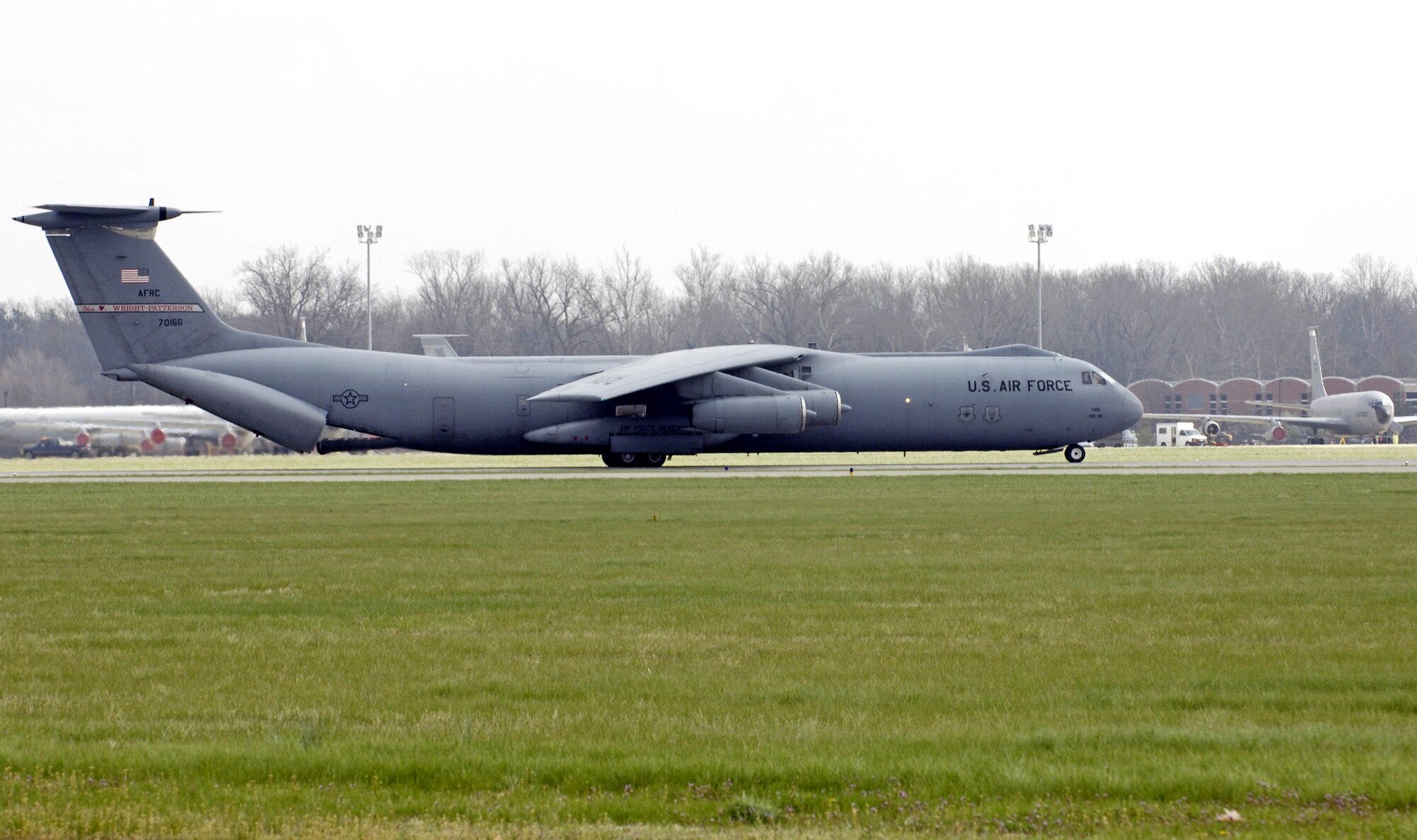 A C-141C Starlifter from the 445th Airlift Wing lands at Scott Air Force Base, Ill., on Friday, April 7, 2006.  The aircraft, tail number 67-0166, made its final flight. It will take its place among other Air Mobility Command aircraft at the heritage airpark being built this year. The 445th, based at Wright-Patterson Air Force Base, Ohio, is converting from the Starlifter to the C-5 Galaxy. (U.S. Air Force photo/Staff Sgt. Tony R. Tolley)