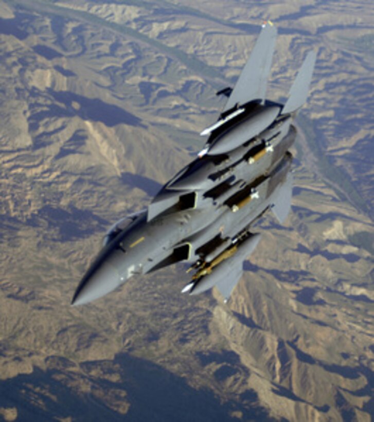 A U.S. Air Force F-15E Strike Eagle aircraft flies over Afghanistan in support of Operation Mountain Lion on April 12, 2006. U.S. Air Force F-15, A-10 Thunderbolt II and B-52 Stratofortress aircraft are providing close-air support to troops on the ground engaged in rooting out insurgent sanctuaries and support networks. The F-15 crew and fighter are deployed to the 336th Expeditionary Fighter Squadron in Southwest Asia from the 4th Fighter Wing at Seymour Johnson Air Force Base, N.C. 