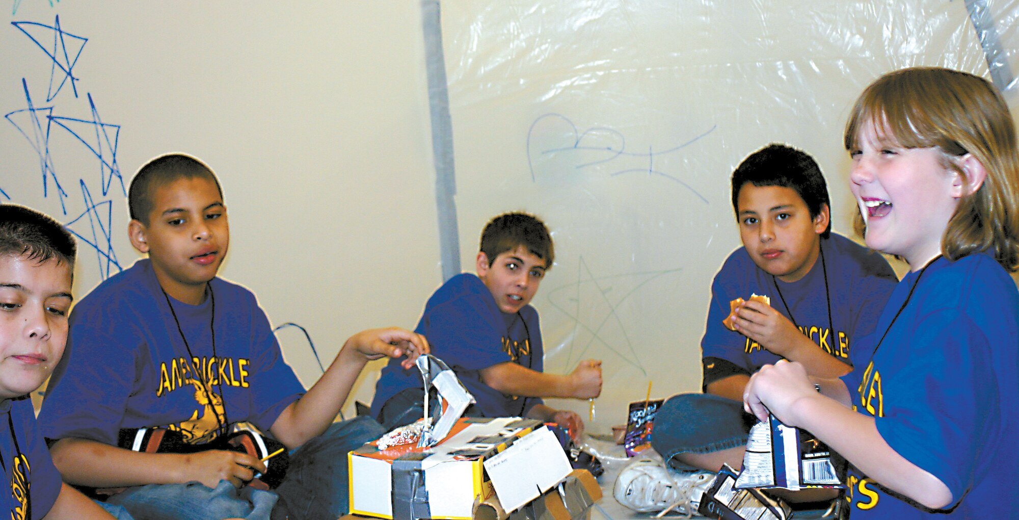 CANNON AIR FORCE BASE, N.M. -- The children who participated in the Mars Mission Flight began planning for the trip months ago. The students had to weigh the food they brought with them and trash they took away. Classes were teamed up with other schools and each team was graded on their performance. (U.S. Air Force photo by Janet Taylor-Birkey)