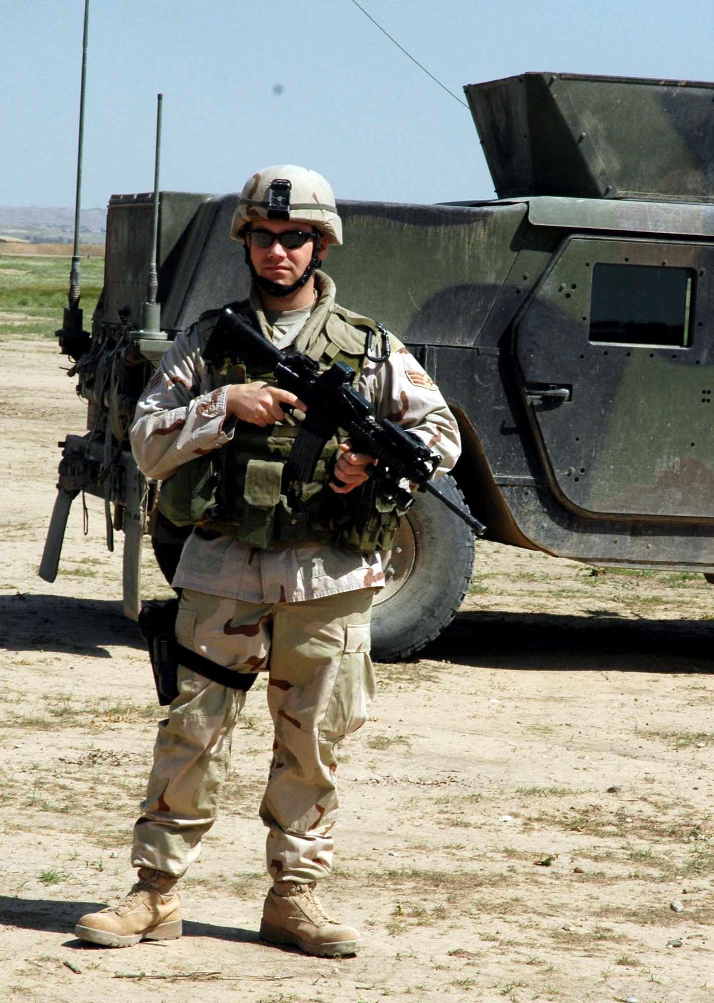 Senior Airman Phillip Burke stands watch on an off-base combat patrol near Kirkuk Air Base, Iraq. He is a member of the 506th Expeditionary Security Forces Squadron. (U.S. Air Force photo/Staff Sgt. Kristina Barrett)
