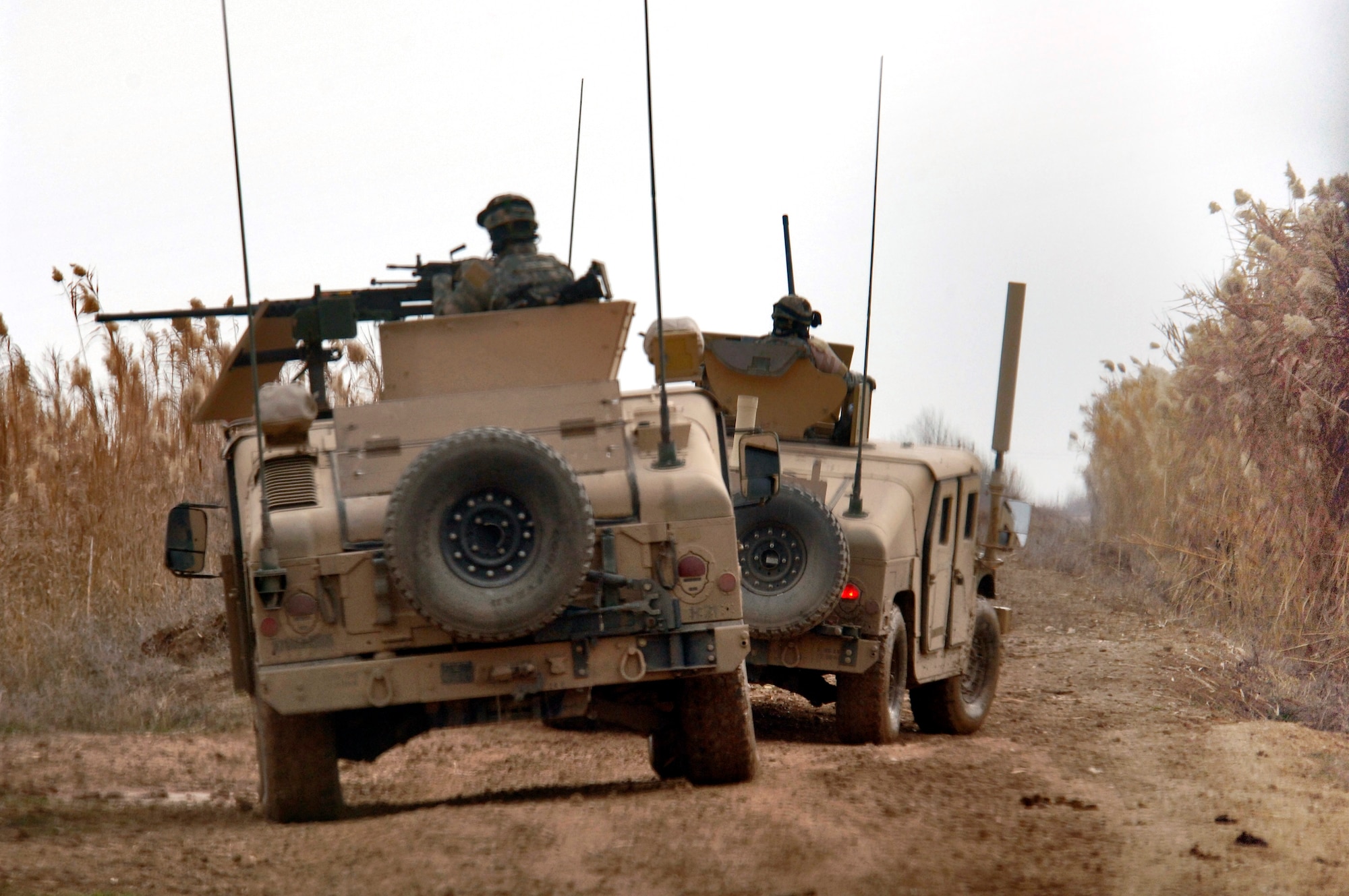 A convoy travels through the rural roads near Kirkuk, Iraq, in January. To ensure that convoys like this have reliable communication, the Air Force is leading a joint implementation of a new "Radio over Internet Protocol Routed" network communication system, known as the RIPRnet. (U.S. Air Force photo/Master Sgt. Lance Cheung)