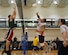 SSgt Robert Mack hits the volleyball over the net, while SSgt Jason Hand tries to prevent it from scoring the point. (US air force photo by SrA Samantha Willner).