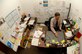 Gerry Swenson, program director for the data conversion lab "makes sense out of madness" in his office at Hampton university on March 15, 2006. The lab was funded by the Department of Defense to convert old paperwork into digital data bases and also to reverse engineer old Machine parts no longer manufactured.(U.S. Air Force photo by Airman First Class Christopher L. Ingersoll)