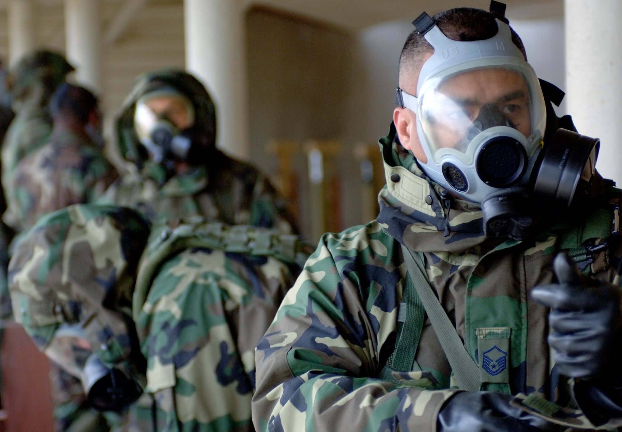 Team Langley members train on the M-9 Beretta handgun and the M-4 assault rifle at the Combat Arms Training and Maintenance (CATM) course on Dec. 14, 2005 at Langley Air Force Base, Virginia. (U.S. Air Force photo by Staff Sgt. Verlin Levi Collins)