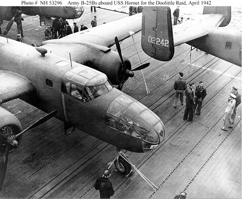 Army Air Forces B-25B bombers parked on the flight deck of USS Hornet (CV-8). The plane in the upper right is tail No. 40-2242 and mission plane No. 8. Capt. Edward J. York piloted the aircraft to targets in the Tokyo area. (U.S. Navy photo). 