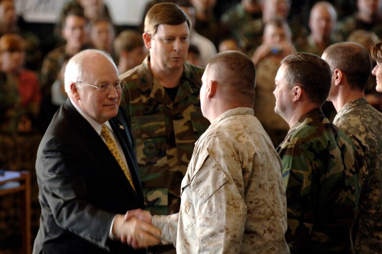 Vice President Richard B. Cheney congratulates Marine Staff Sgt. Joseph Bowman after reading the enlistment oath to 18 Airmen, Soldiers and Marines at Fairchild Air Force Base, Wash., on Monday, April 17, 2006. The vice president addressed a crowd of more than 600, thanking the troops for their contributions and sacrifices. (U.S. Air Force photo/Staff Sgt. Laura K. Smith)
