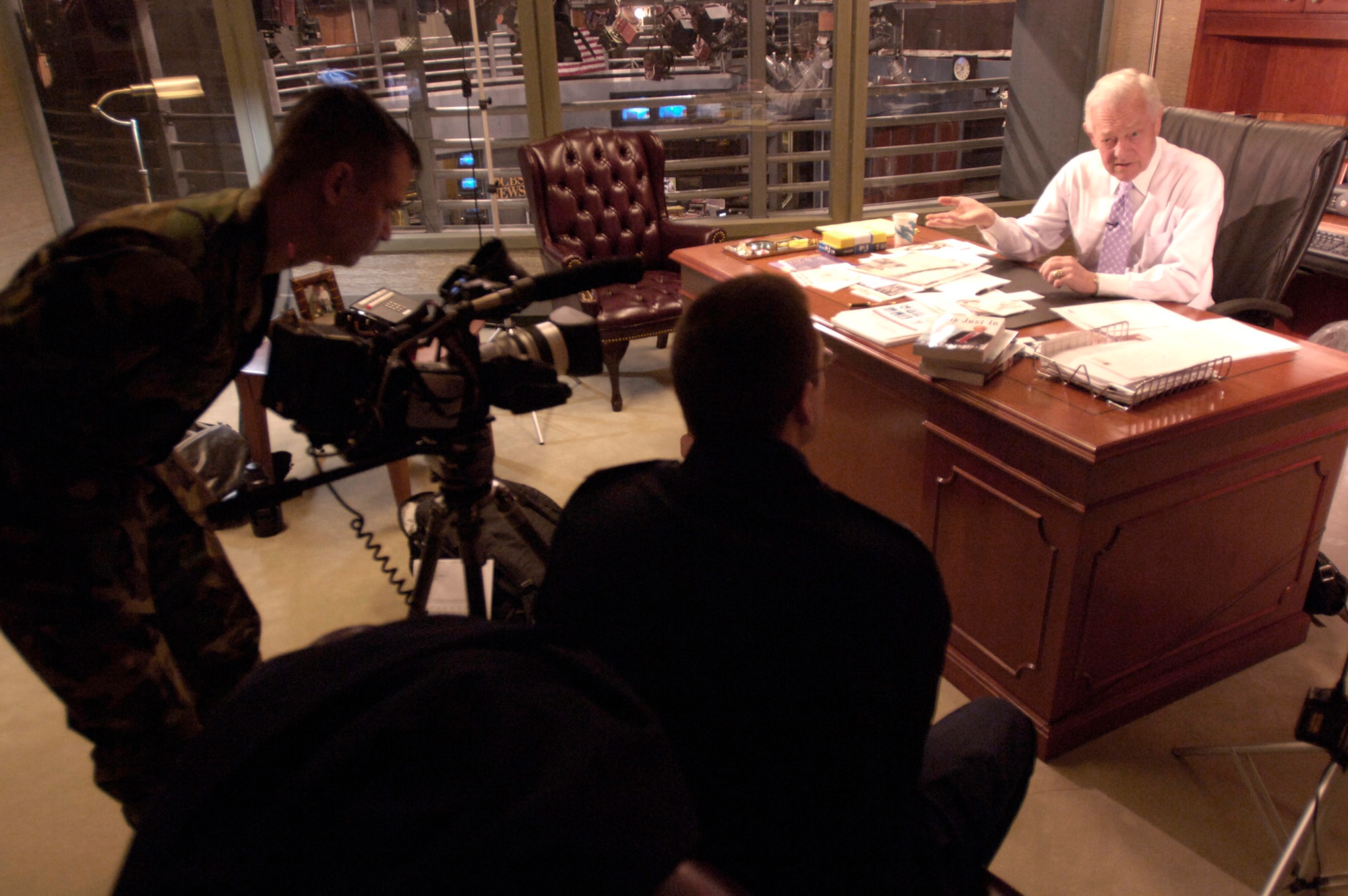 Bob Schieffer, chief Washington correspondent for "CBS News" and anchor/moderator of "Face the Nation," is interviewed by Capt. Matthew Bates and Tech. Sgt. Mike Tateishi at CBS in New York City on Tuesday, April 11, 2006. In the 1960s, Mr. Schieffer served as an Air Force public affairs officer at Travis Air Force Base, Calif. Captain Bates is the Air Force News media liaison in New York City; Sergeant Tateishi is a video broadcaster at the Air Force News Agency in San Antonio. (U.S. Air Force photo/Master Sgt. Scott Wagers)