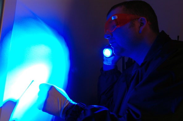Special Agent Duran Smith practices collecting evidence with a test kit used to process crime scenes. Special Agent Smith is assigned to Fairchild’s Office of Special Investigation Detachment 322. The unit was recognized as the 2005 Air Force OSI Small Detachment of the Year. (U.S. Air Force photo by Staff Sgt. Nathan Gallahan.)