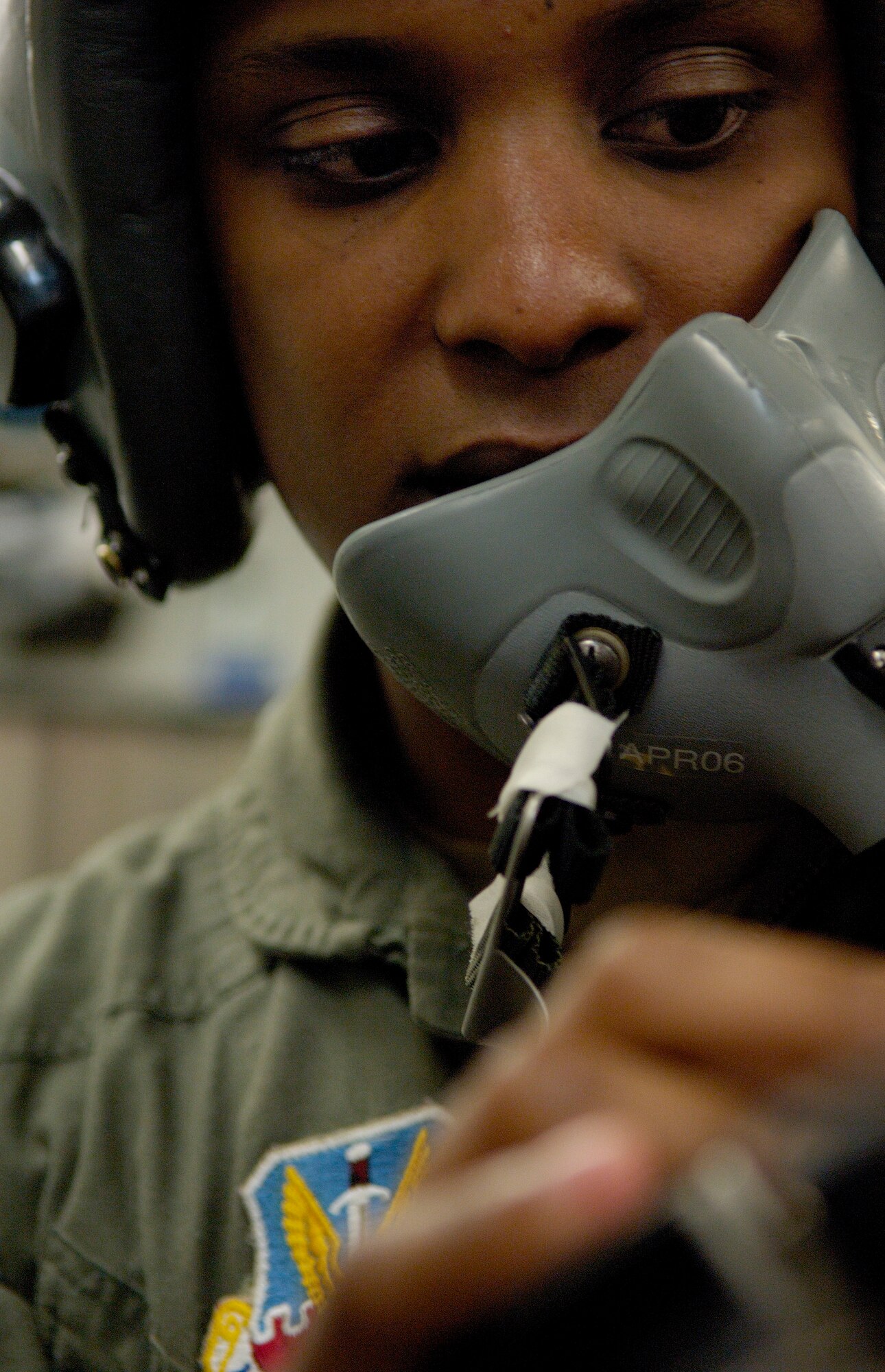 Senior Airman Chris Helton, an aerospace physiology technician stationed at Langley AFB, checks the oxygen regulator control panel in the altitude chamber prior to use by Federal Aviation Administration students, on 19 Apr 2006 at the Aerospace Physiology facility on Langley. While in the altitude chamber students are exposed to atmospheric conditions at 25,000 ft. Without the aid of an oxygen mask they experience symptoms of hypoxia, a oxygen deficiency of the tissue and blood cells that causes impairment of function at high altitudes. (USAF Photo By SSgt Samuel Rogers)