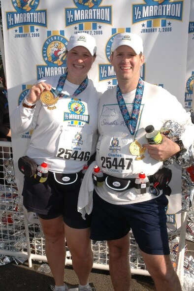 Master Sgt. Charles "Tom" Rados and his wife, Laura, complete the Disney Half Marathon in January. The couple signed up for the marathon to keep Seregeant Rados moitvated to improve his running and cardiovascular endurance.