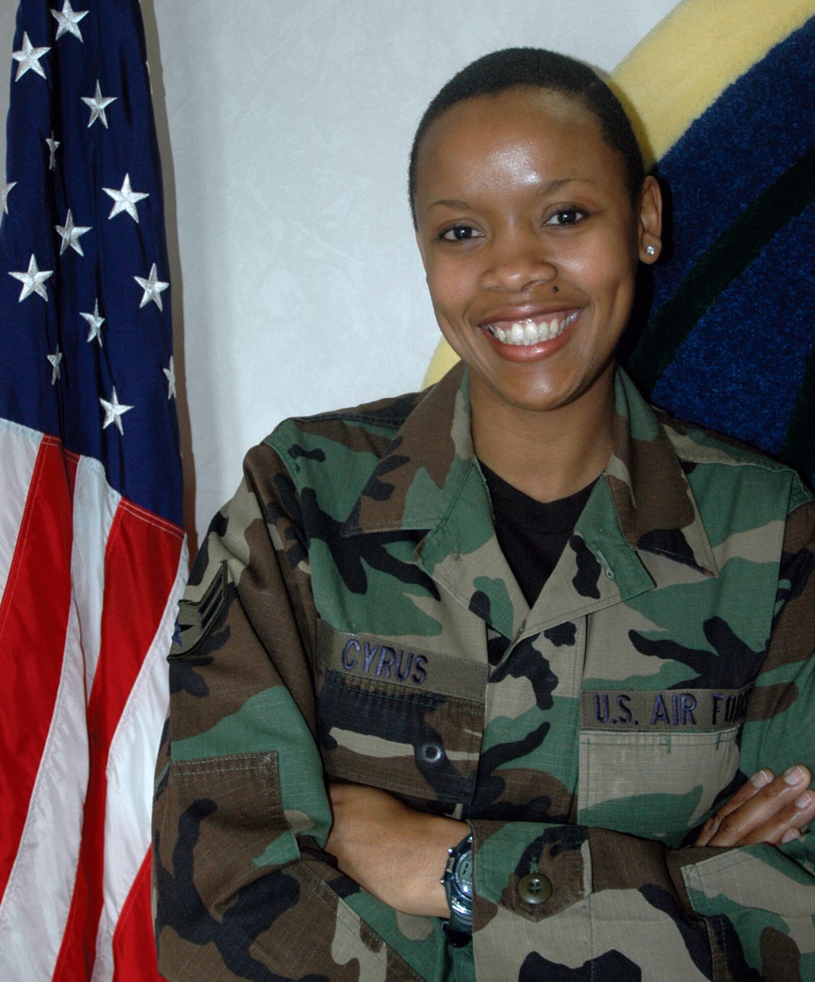 MCCHORD AIR FORCE BASE, Wash., - Airman First Class Nicole Cyrus, a Reservist with the 728th Airlift Squadron, became a U.S. citizen March 20. A native of the Caribbean island Trinidad and Tobago, Airman Cyrus immigrated to western Washington in 2001.