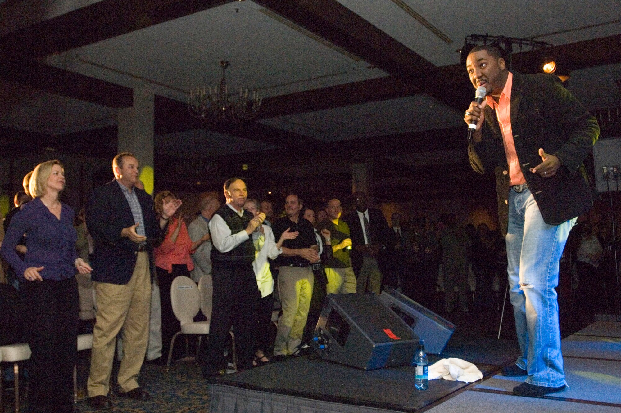 George Huff sings during United States Air Forces in Europe's "USAFE Idol" talent contest on Saturday, April 22, 2006, at Ramstein Air Base, Germany. Mr. Huff, a New Orleans native, is a recording artist and finalist from TV's 2004 "American Idol" season. He sang two songs during the show and was one of the five judges. (U.S. Air Force photo/Master Sgt. John E. Lasky) 
