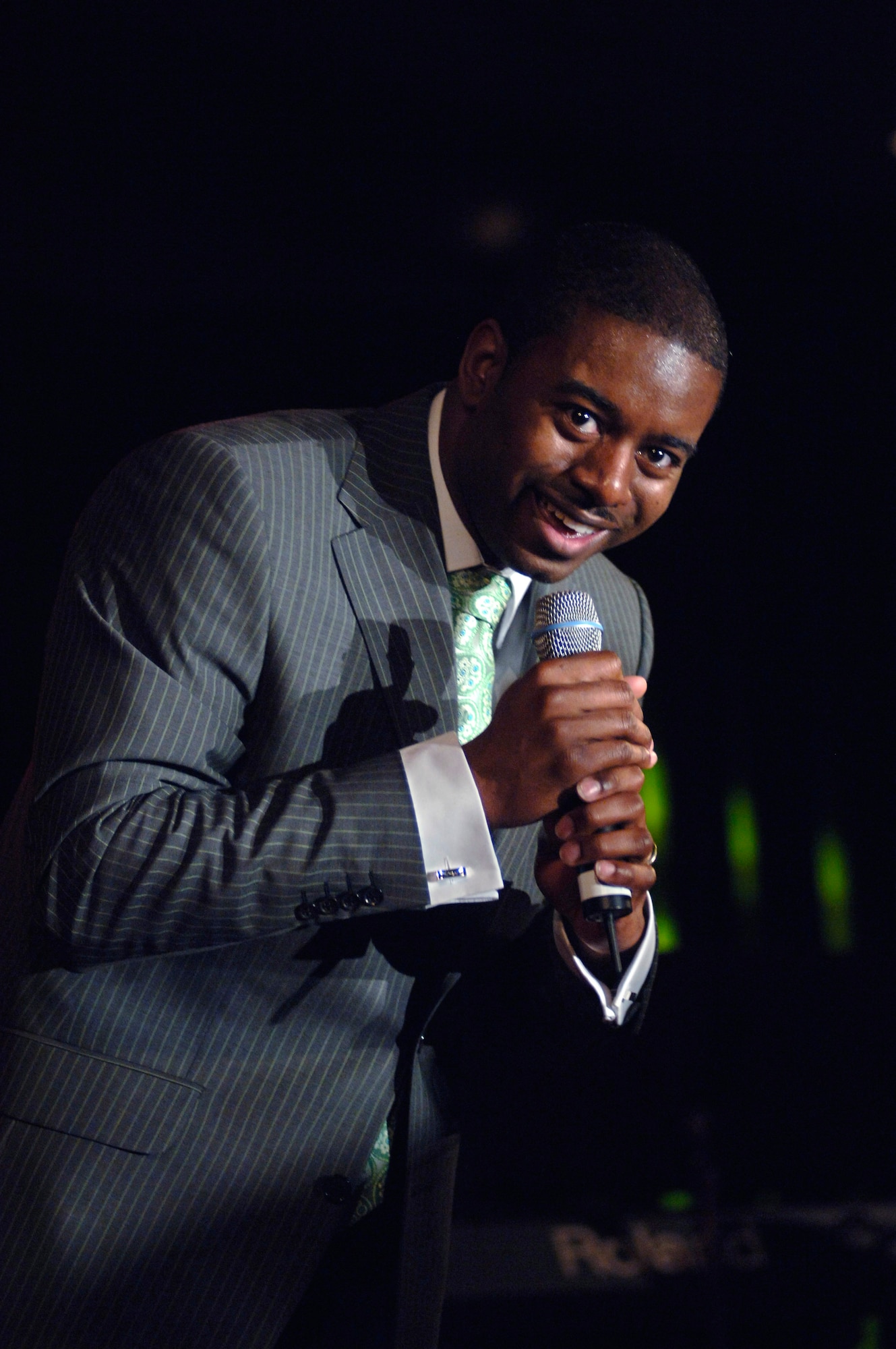 Senior Airman Antonio Howard sings "Superstitious" during United States Air Forces in Europe's "USAFE Idol" talent contest Saturday, April 22, 2006, at Ramstein Air Base, Germany. He won this year's competition. Airman Howard, of Dublin, Ga., is a security forces journeyman with the 703rd Munitions Squadron at Volkel Air Base, Netherlands. (U.S. Air Force photo/Master Sgt. John E. Lasky) 
