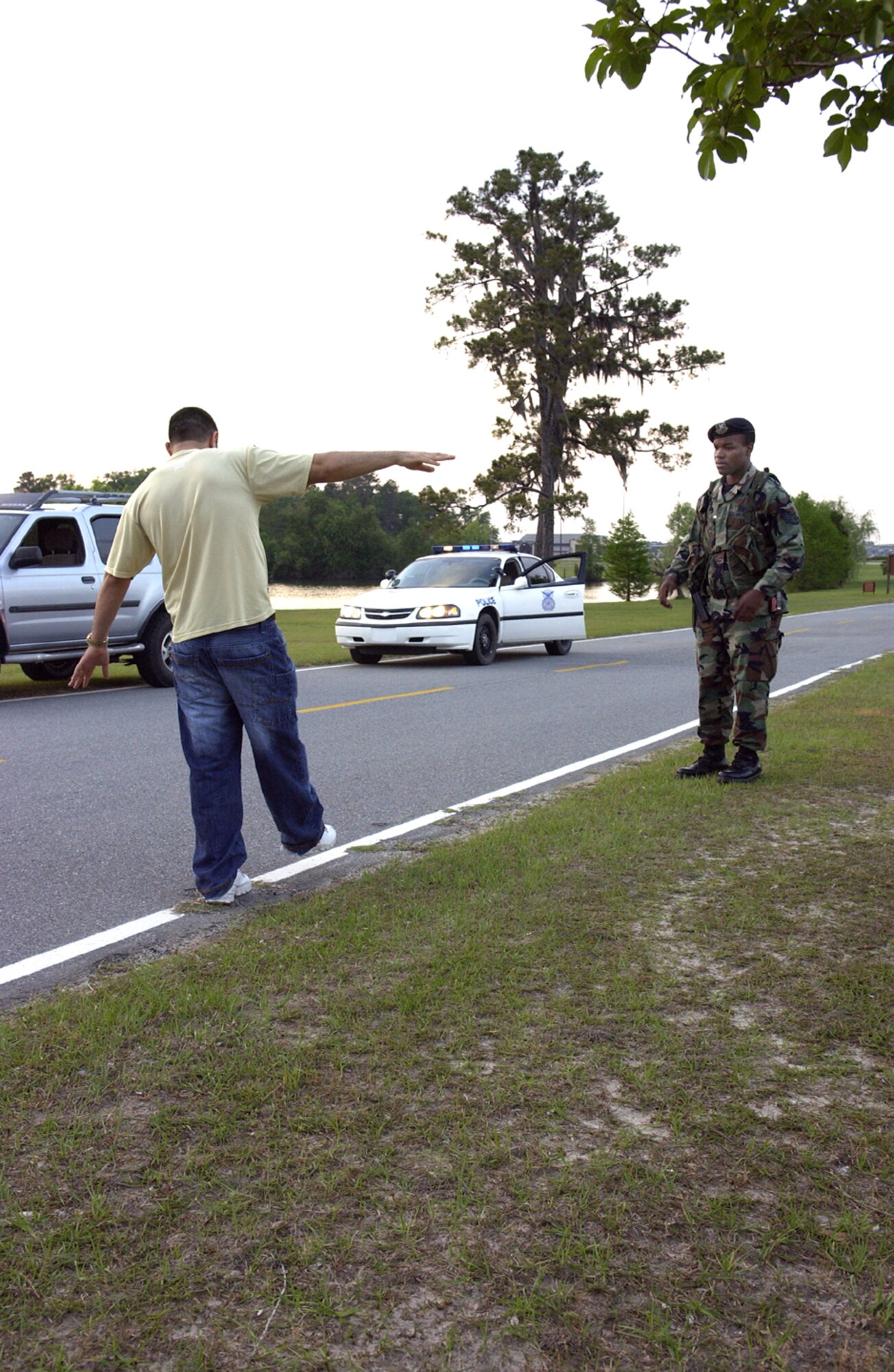 Staff Sgt. Xavier Daniel practices giving a field sobriety test at Moody Air Force Base, Ga., Monday, April 17, 2006. He is assigned to the 347th Security Forces Squadron. (U.S. Air Force photo/Airman Elizabeth Rissmiller) 
                  
