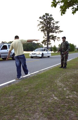 Staff Sgt. Xavier Daniel practices giving a field sobriety test at Moody Air Force Base, Ga., Monday, April 17, 2006. He is assigned to the 347th Security Forces Squadron. (U.S. Air Force photo/Airman Elizabeth Rissmiller)                   
