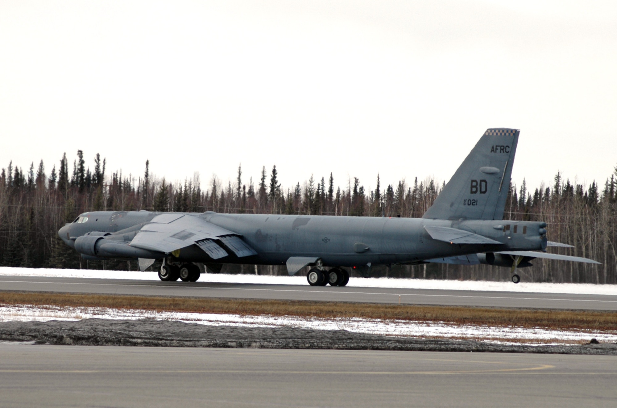 An Air Force Reserve crew lands a B-52 Stratofortress at Eielson Air Force Base, Alaska, after a familiarization flight in preparation for Red Flag-Alaska 06-2. The exercise, previously called Cope Thunder, focuses on joint offensive counter-air, interdiction, close-air support and large-force employment training. The aircraft is from the 93rd Bomb Squadron at Barksdale AFB, La. (U.S. Air Force photo/Tech. Sgt. Jeff Walston) 