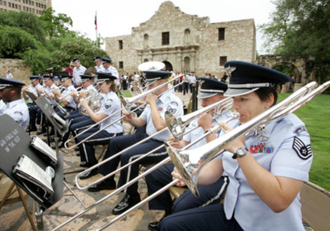 The Air Force Band of the West performs in front of the Alamo during the opening ceremonies of Fiesta, an annual celebration in San Antonio, Texas, on April 21, 2006. The Band of the West is from Lackland Air Force Base, Texas. 