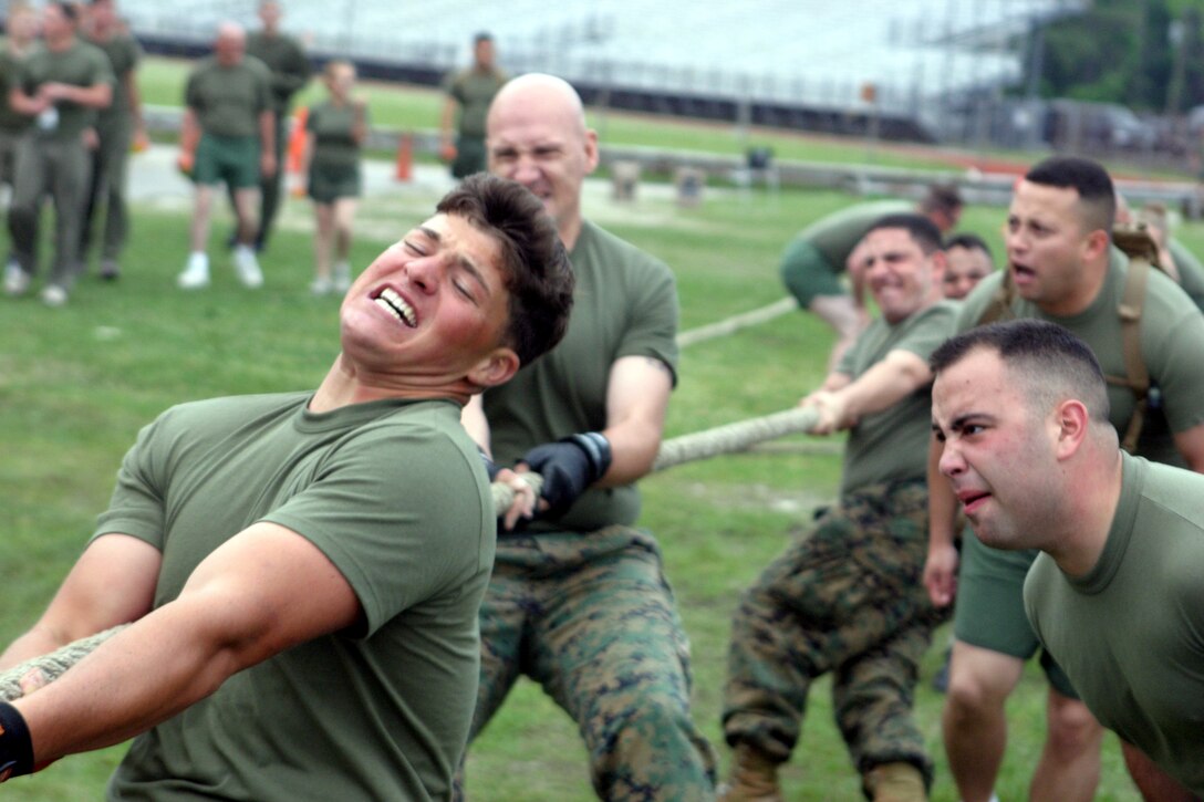 MARINE CORPS BASE CAMP LEJEUNE, N.C. (April 26, 2006) - Corporal Sammy W. Meek of Darien, Conn., a nuclear, biological and chemical specialist with Headquarters Company, Headquarters and Service Battalion, 2nd Marine Logistics Group, participates in the tug-of-war event at the Battalion Sports Day at Geottge Memorial Field April 26.