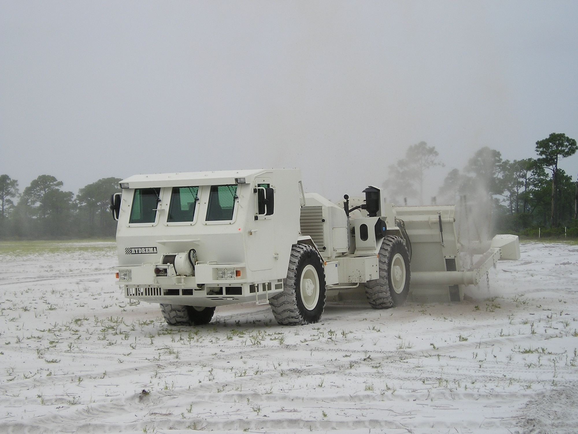 TYNDALL AIR FORCE BASE, Fla. — The Mine Area Clearance Vehicle is seen using its flail in a mine clearing operation.    The vehicle was recently converted to remote operation by the Air Force Research Laboratory Materials and Manufacturing Directorate, Airbase Technology Division Force Protection Branch. (Air Force photo)

