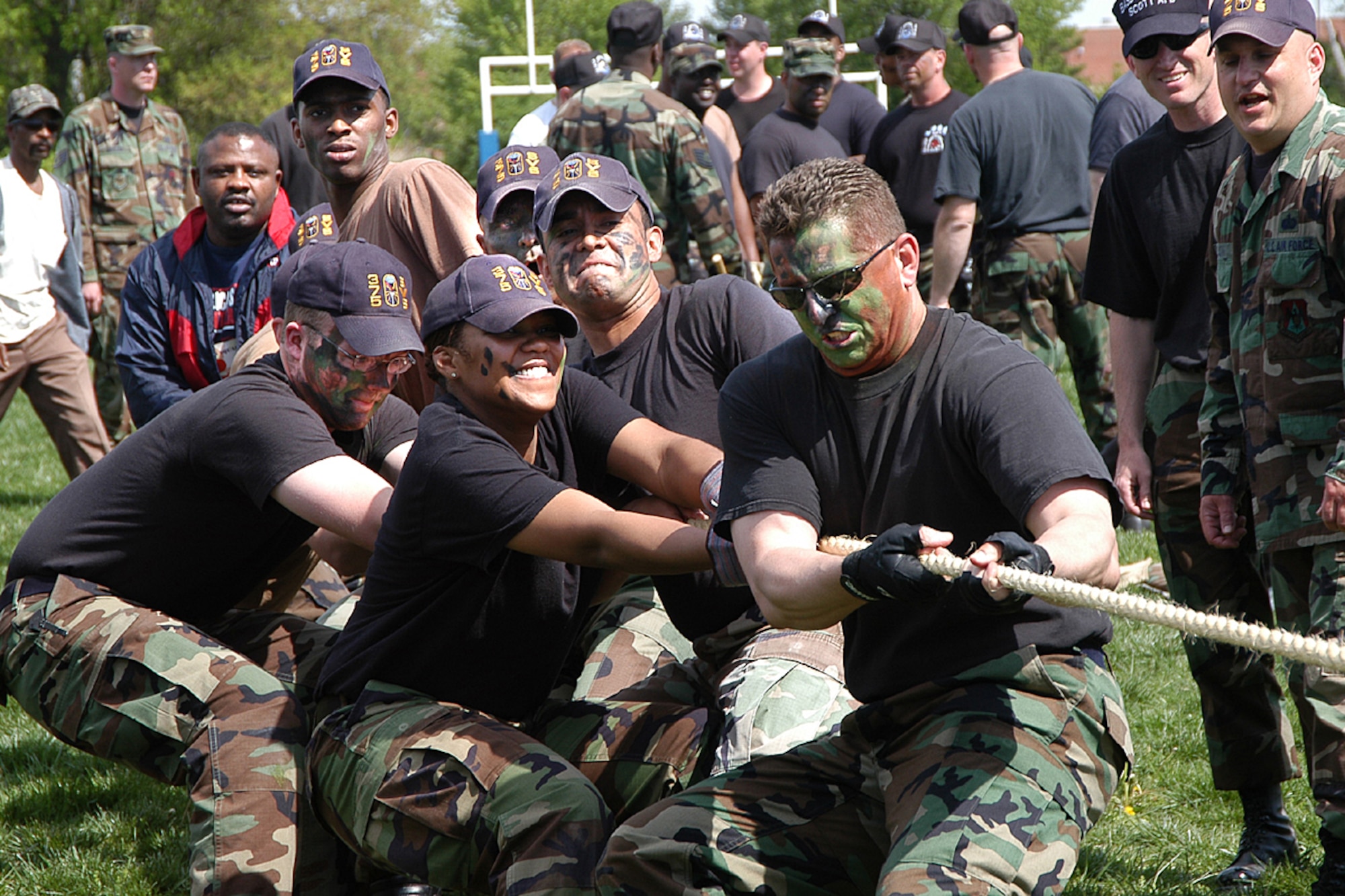 Members of the 375th Services Squadron attempt to unbalance their competitors during the tog-of-war, the culminating event of the 375th Mission Support Group's Combat Field Day on April 21, 2006.