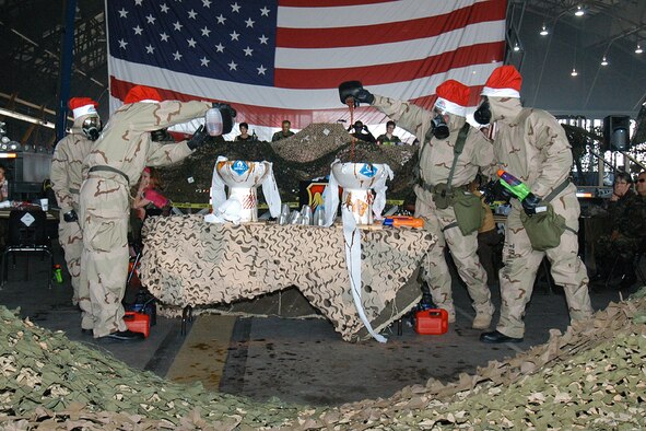 Team Scott members mix the grog during the 375th Mission Support Group Combat Dining Out held at Hangar One April 22, 2006..  