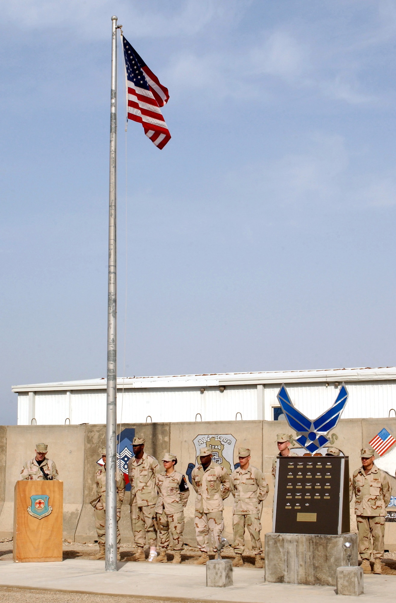 Airmen from the 407th Air Expeditionary Group take part in a recognition ceremony for the Fallen Airman Memorial at Ali Base, Iraq, on Wednesday, April 26, 2006. (U.S. Air Force photo/Staff Sgt. Bradley C. Church)