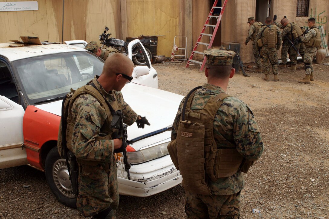 CAMP PENDLETON, Calif. (Apr. 26, 2006) -- Marines of the Maritime Special Purpose Force Security Element, 15th Marine Expeditionary Unit, practice setting up a vehicle check point in a mock Iraqi village at Stu Segal Studios in San Diego. The 15th MEU MSPF conducted this training in preparation for a deployment to the Western Pacific later this year. (Official USMC photo by Cpl. Scott L. Eberle) (Released)