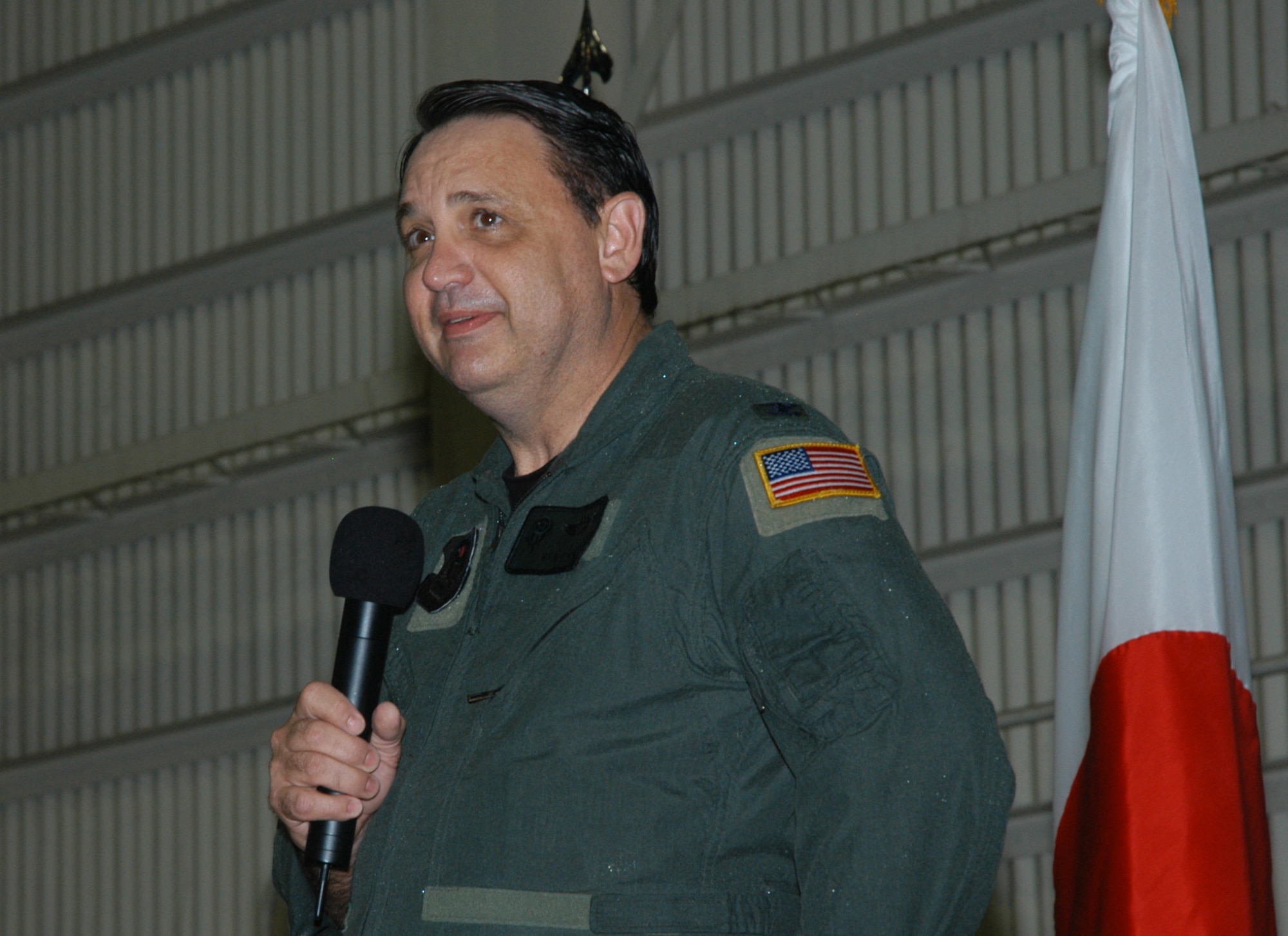 Retired Col. Kenneth Poole, who served 24 years with Special Forces, speaks during the 353rd Special Operations Group Combat Dining Out April 22 at Kadena Air Base, Japan.  The dining out coincided with the 26 anniversary of Operation Eagle Claw.                           