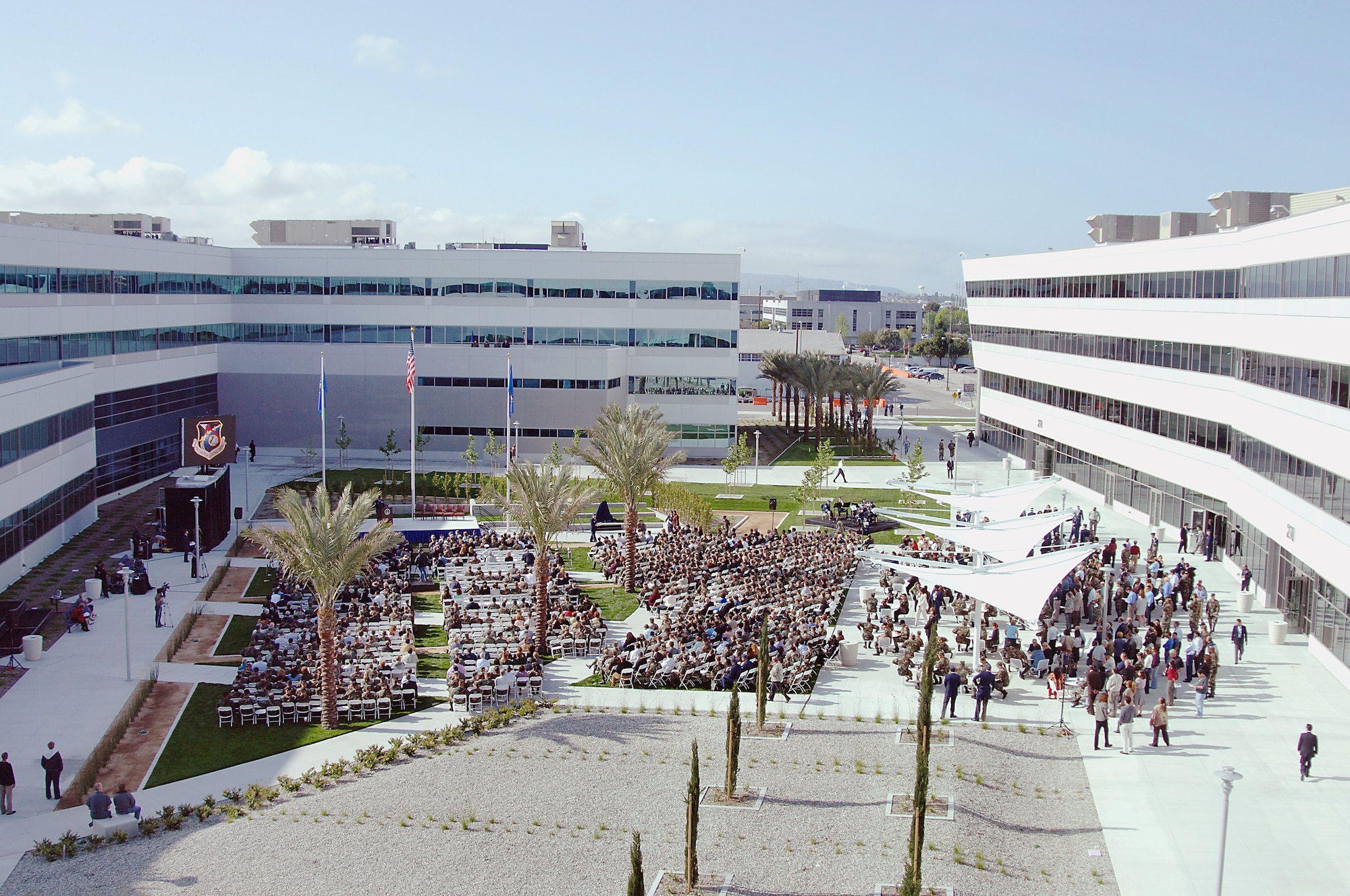More than 1,000 civic leaders, Airmen, base employees and guests gather for the dedication of the new Schriever Space Complex in El Segundo, Calif., on Monday, April 24, 2006. (U.S. Air Force photo/Joe Juarez) 


