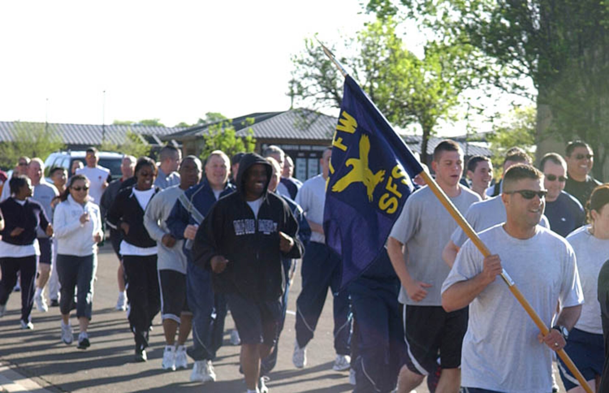 CANNON AIR FORCE BASE, N.M. - Cannon Airmen complete a 3.1 mile Earth Day fun run April 19 around Whispering Winds Golf Course. The 27th Communications Squadron had the most runners of the 282 participants, but the 27th Comptroller Squadron won the Earth Day trophy because it had the greatest percentage of runners. (U.S. Air Force photo by Airman 1st Class Brian Ellis)