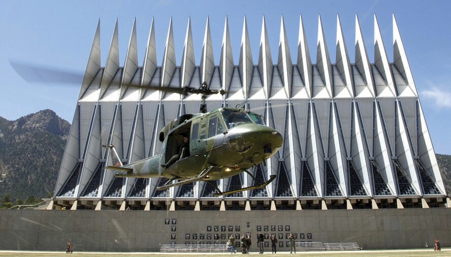 A UH-1N “Huey” from the 54th Helicopter Squadron leaves the Air Force Academy after being on display for a few hours   at the Academy Terrazzo April 20.  Cadets were able to inspect the chopper and ask the crew members questions.  The crew members were 1st Lts. Travis Hinkle and Brent Golembiewski and Airman 1st Class Neal Hardin, all from the 54th HS.(U.S. Air Force photo by Charley Starr)