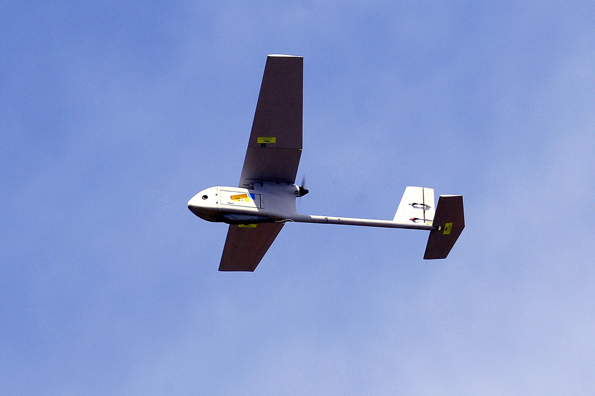 An unmanned aerial vehicle with a camera mounted on board was the focus of a Remote Operated Video Enhanced Receiver demonstration July 28 at the U.S. Air Force Academy. The ROVER is basically a laptop with antennas that receives video captured by a UAV that shows real-time, nearby dangers allowing ground troops to make quick decisions regarding air strikes. (U.S. Air Force photo/Dennis Rogers)