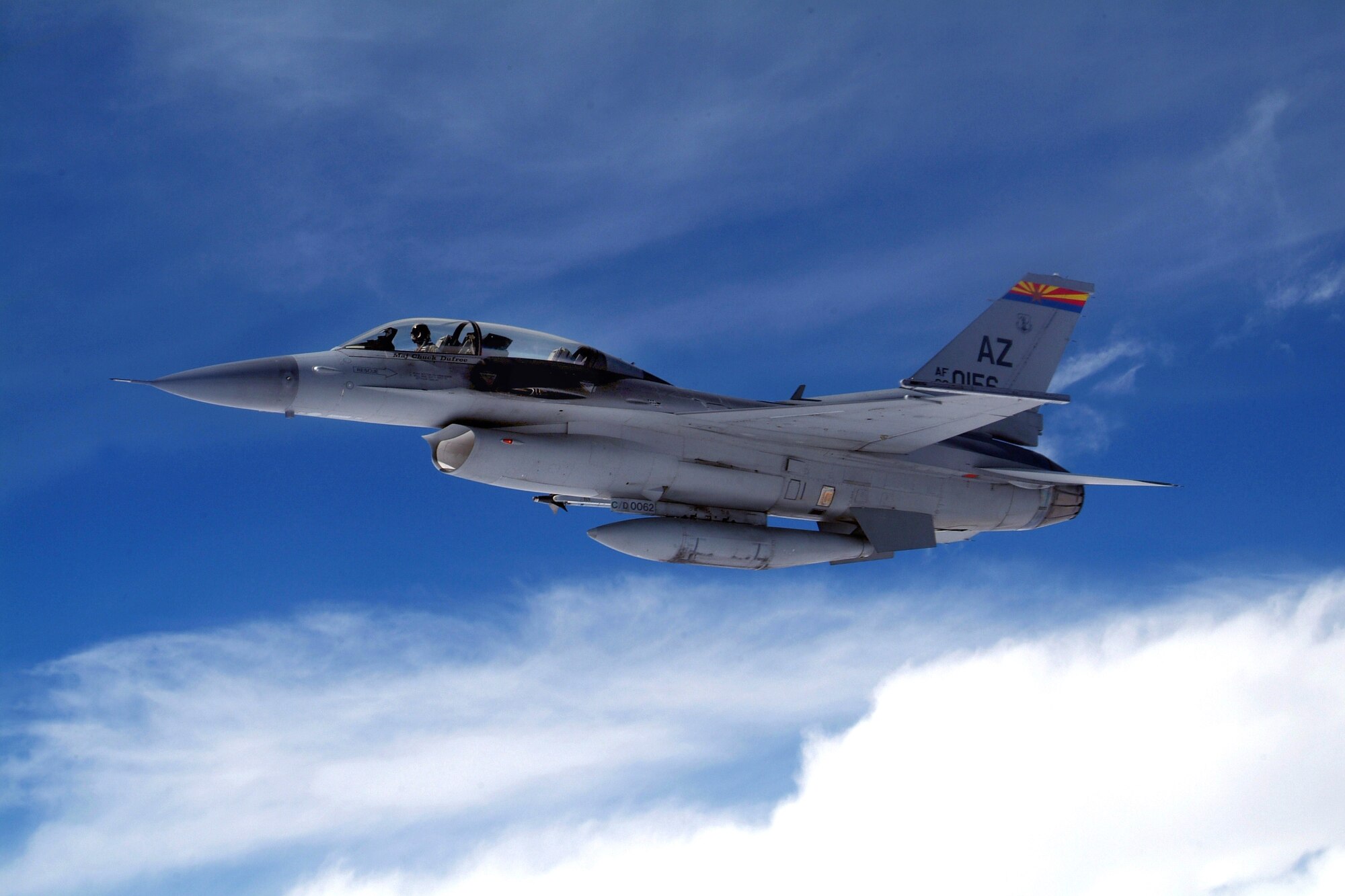 An F-16 Fighting Falcon flies alongside a KC-135 Stratotanker during an incentive flight for students in the Civil Air Patrol and Aviation Careers Education Camp in Phoenix on Aug. 1. The camp was held in conjunction with the Tuskeegee Airmen Convention. The aircraft are with the Arizona Air National Guard. (U.S. Air Force photo/Tech. Sgt. Joe Zuccaro) 
