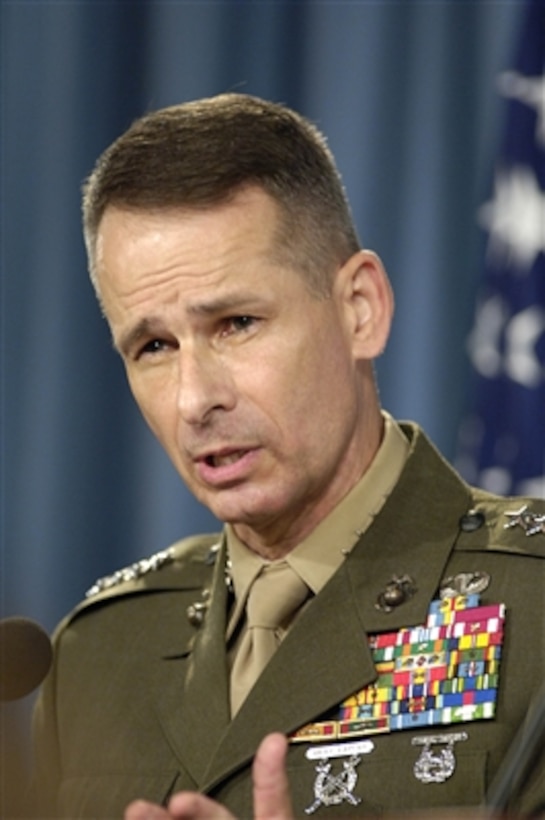 Chairman of the Joint Chiefs of Staff Gen. Peter Pace, U.S. Marine Corps, discusses his recent trip to Afghanistan during a press briefing in the Pentagon in Arlington, Va., on Aug. 2, 2006.  Pace joined Secretary of Defense Donald Rumsfeld at the lectern to take questions from members of the news media.  