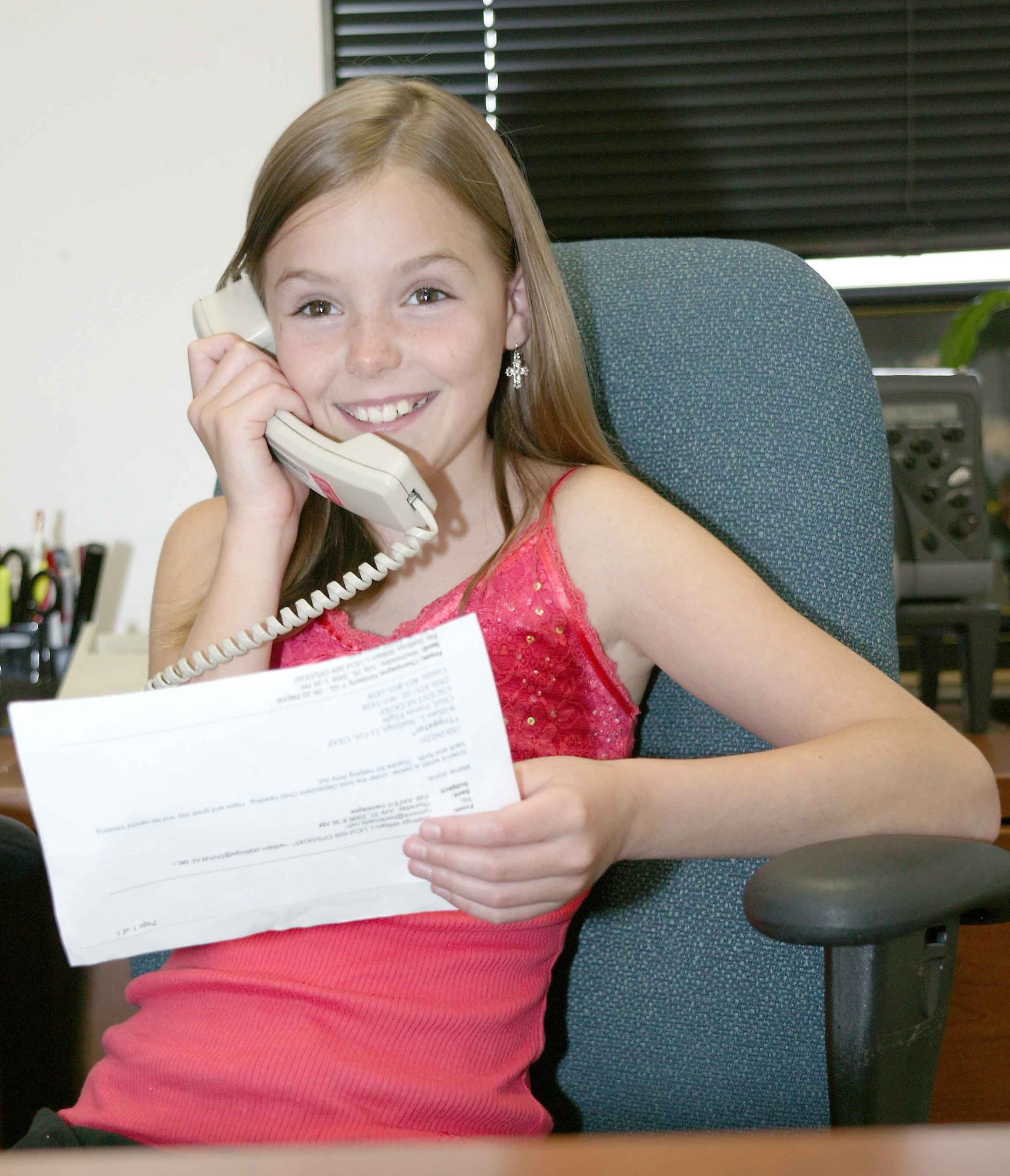 Arden, daughter of Amy and Lt. Col. Tripp Stallings, 609th Combat Plans Squadron, records a safety message July 26.  Hear her message at an exchange facility near you.  (U.S. Air Force photo/Senior Airman Holly MacDonald)