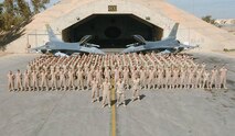 Members of the 4th Fighter Squadron pose for a photo at Balad Air Base, Iraq. They are scheduled toreturn to Hill in May.