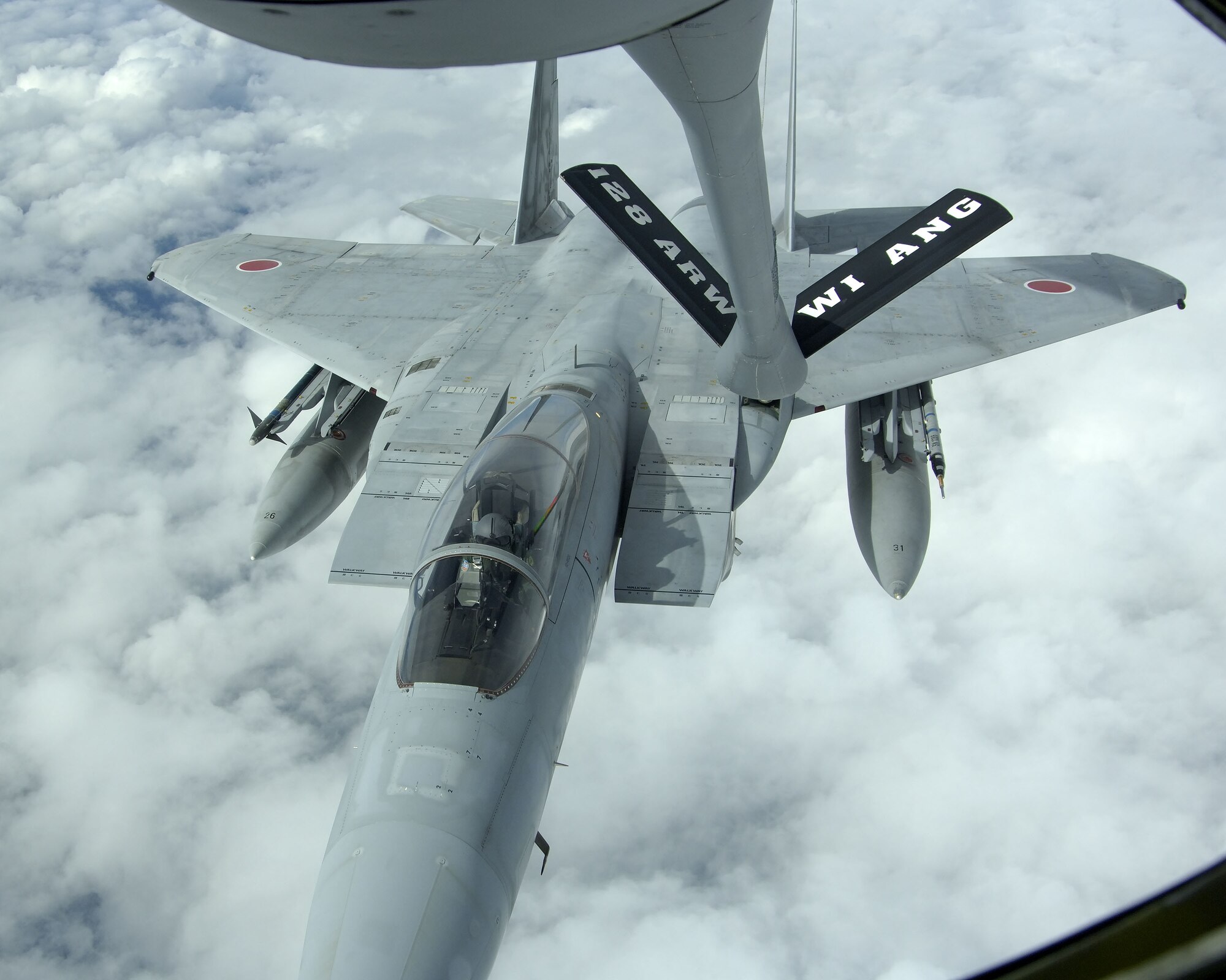 EIELSON AIR FORCE BASE, Alaska - A Japan Air Self Defence Force F-15 refuels from of a United States Air Force KC-135 Tanker during Excersise Cooperative Cope Thunder 06-3 (CCT06-3). Photo by Cpl J.A. Wilson, Excersise COOPERATIVE COPE THUNDER 06-3 Public Affairs

