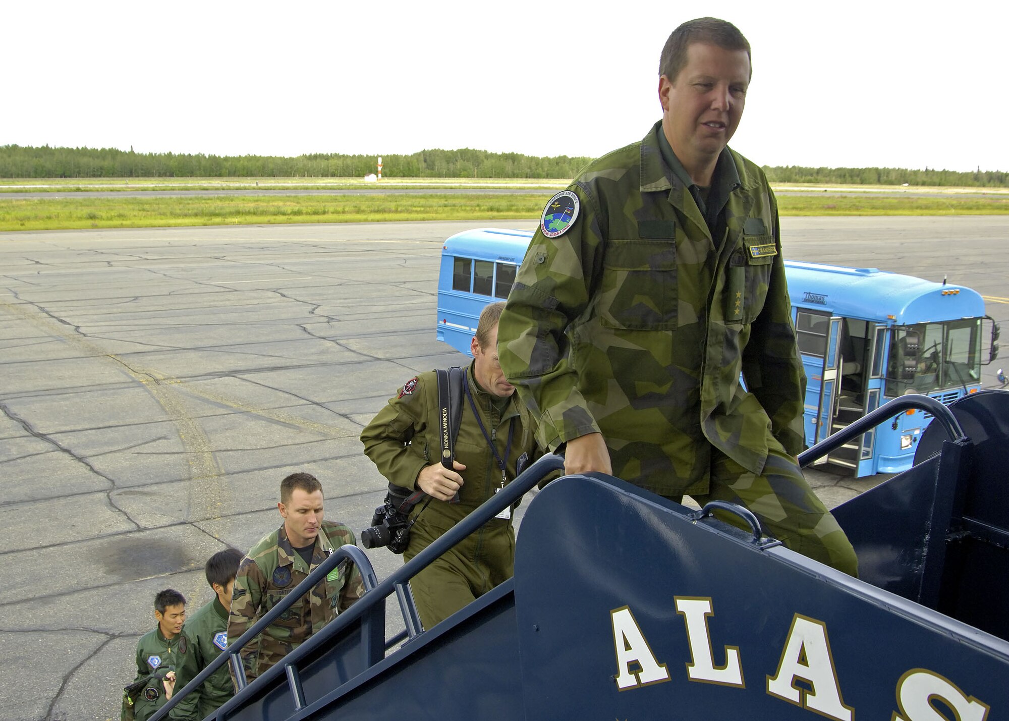 EIELSON AIR FORCE BASE, Alaska - Swedish Air Force, Unite States Air Force (USAF), Japan Air Self Defence Force, and Canadian Forces personnel board a USAF KC-135 Tanker for a familiarization flight during Excercise Cooperative Cope Thunder 06-3 (CCT06-3). Photo by Cpl J.A. Wilson, Excercise COOPERATIVE COPE THUNDER 06-3 Public Affairs

