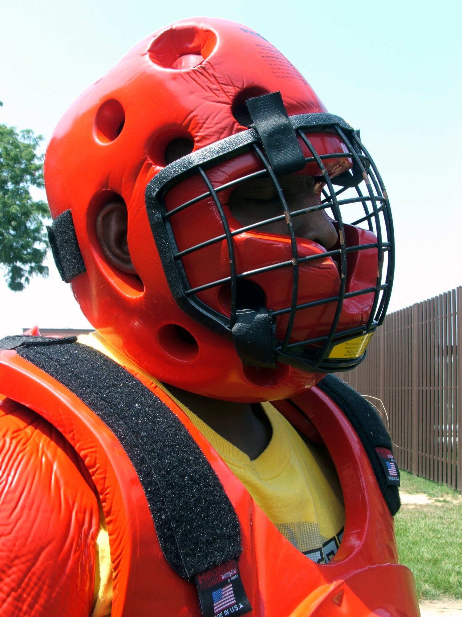 Staff Sgt. Rudolph Stuart is dressed in a "red man" suit used for training with security forces students in the Phoenix Raven course at Fort Dix, N.J., on Aug. 1. The course, taught by the Air Mobility Warfare Center's 421st Combat Training Squadron staff, trains security forces in use of force, anti-hijacking measures and aircraft security. Sergeant Stuart is a course instructor. (U.S. Air Force photo/Tech. Sgt. Scott T. Sturkol)
