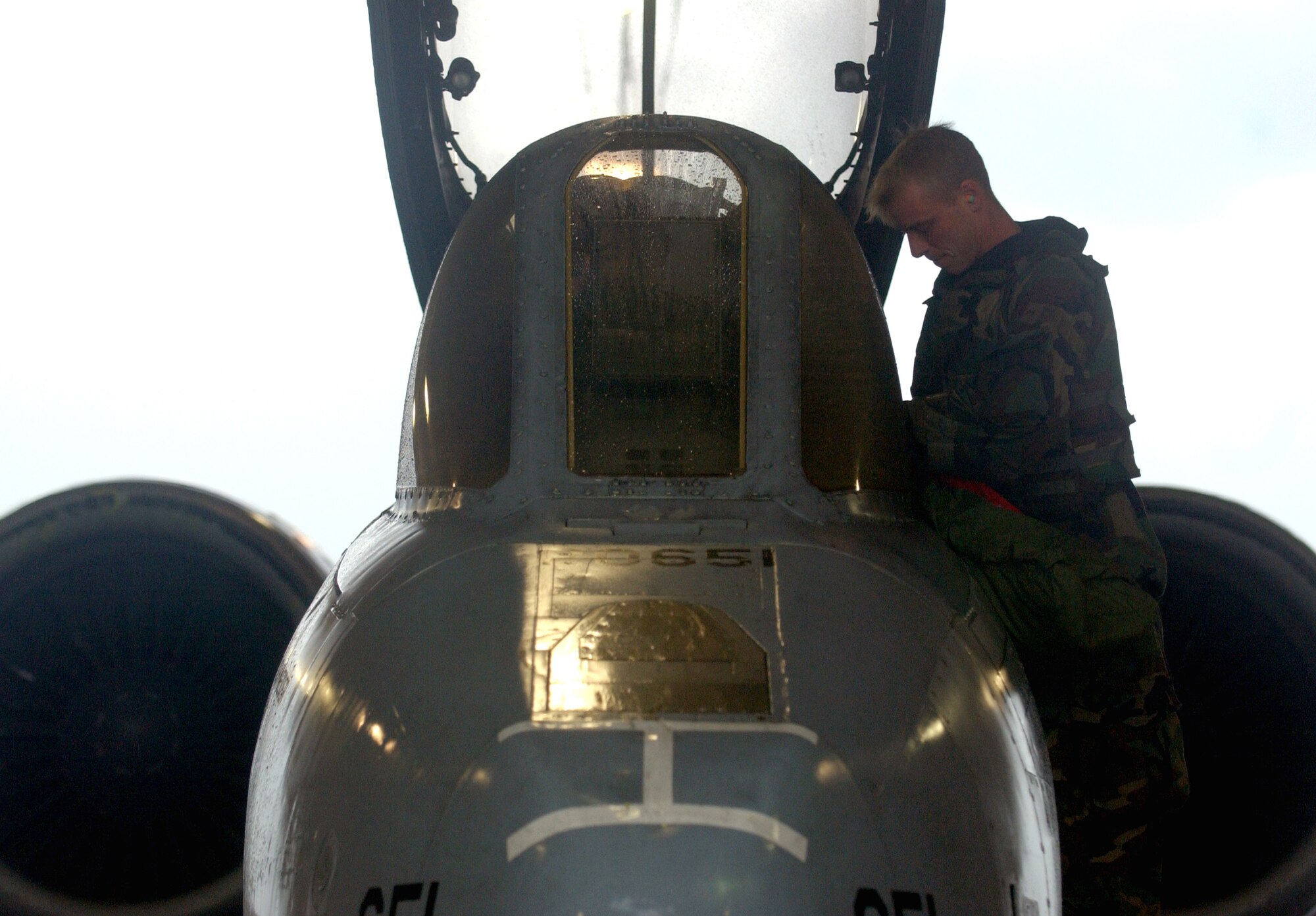 An A-10 Thunderbolt II crewchief inspects an aircraft during Exercise Beverly Bulldog at Osan Air Base, South Korea, on July 28. (U.S. Air Force photo/Airman 1st Class Chad Strohmeyer)

