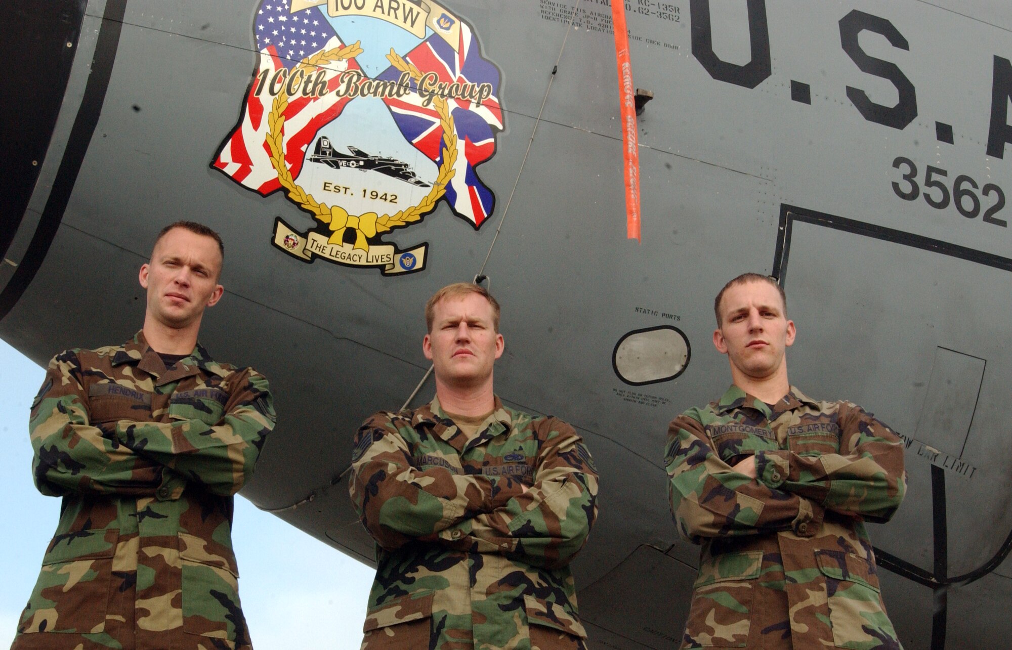 From left to right, Airman 1st Class Austin Hendrix, Staff Sgt. Mark Marcuson and Senior Airman Daniel Montgomery are three of the four maintainers from the 100th Aircraft Maintenance Squadron responsible for KC-135, tail number 62-3562, flying out with a black letter initial July 21. The black letter initial meant  there was nothing wrong with the plane, no work orders were due and nothing needed to be fixed or replaced.  (U.S. Air Force photo by Airman 1st Class Teresa Pumphrey)