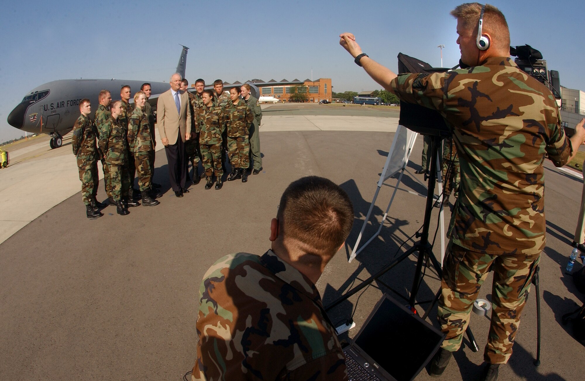 Secretary of the Air Force Michael W. Wynne prepares to shoot a segment for American Forces Network July 18 during his visit to RAF Mildenhall, England.  It was the secretary's first visit to the base since assuming his post in 2005. While here, Secretary Wynne had the opportunity to learn about base-level issues and interface directly with Airmen.  (U.S. Air Force photo by Tech Sgt. Jeanette Copeland)